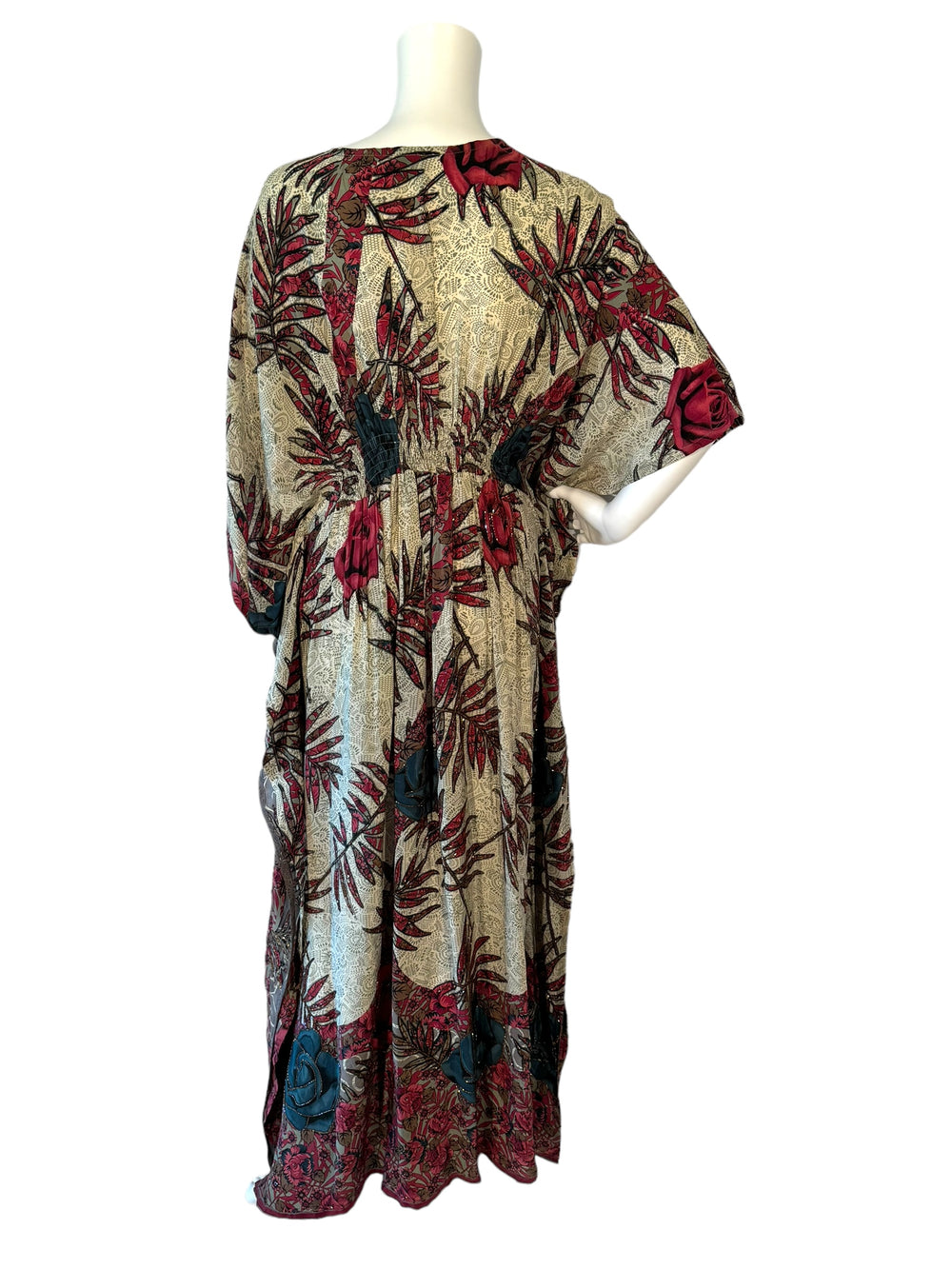 Back view of ML vintage silk kaftan in bold leaf patter in red on cream