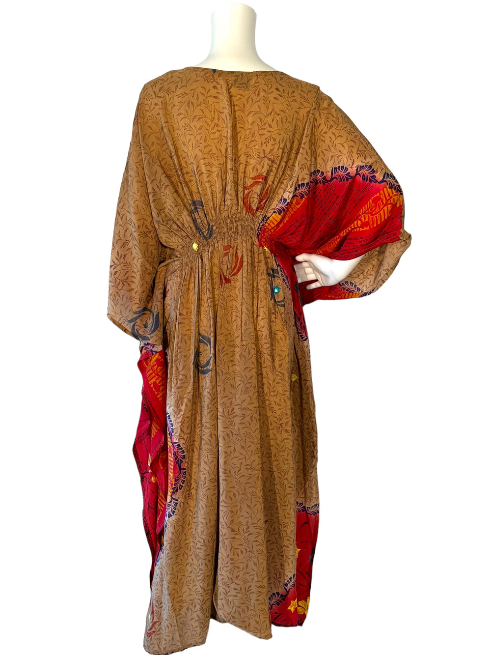 Back view of vintage silk XXL kaftan in gold and red with embroidery
and sequins