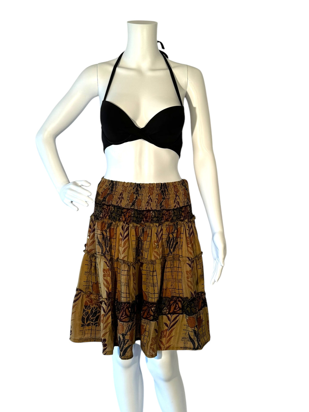 Mannequin wearing gather elastic waist vintage silk tiered skirt in beige with brown and rust botanical print