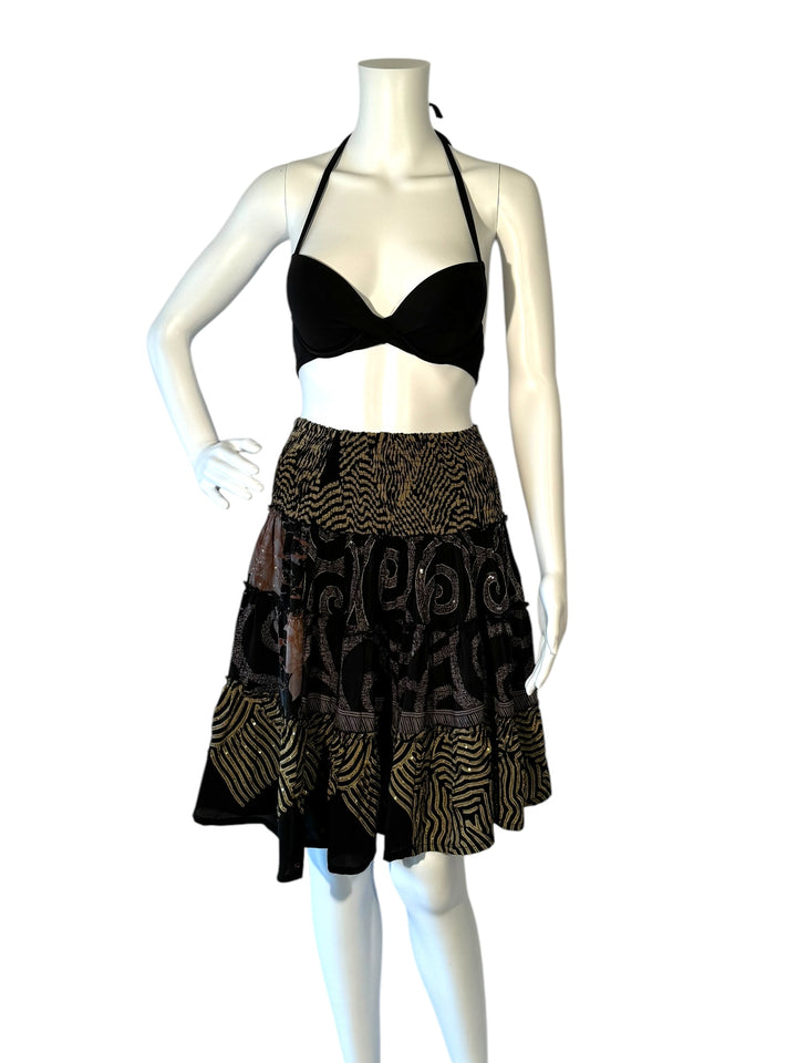 Mannequin wearing gather elastic waist vintage silk tiered skirt in black with tan prints and sequins 