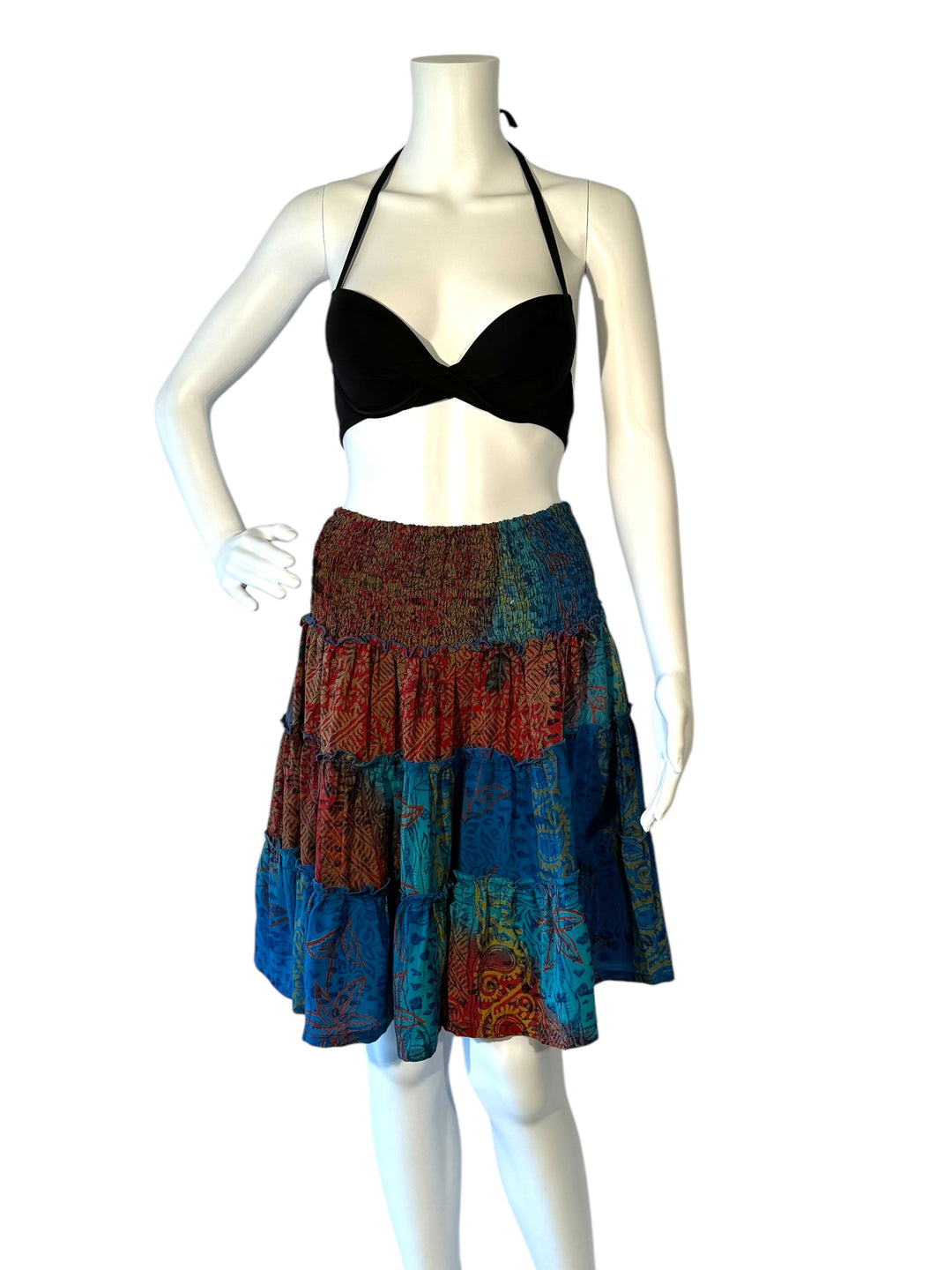 Mannequin wearing gather elastic waist vintage silk tiered skirt in blue with red and orange prints