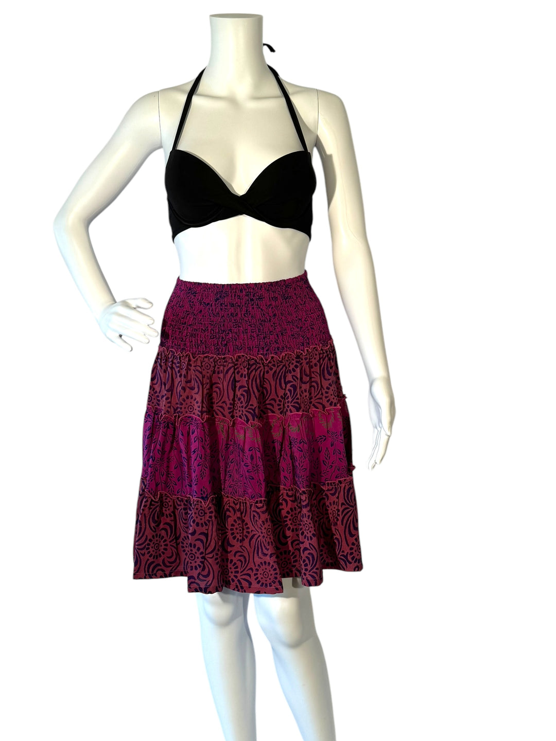 Mannequin wearing vintage silk gathered elastic short tiered skirt  pink with dark swirl print