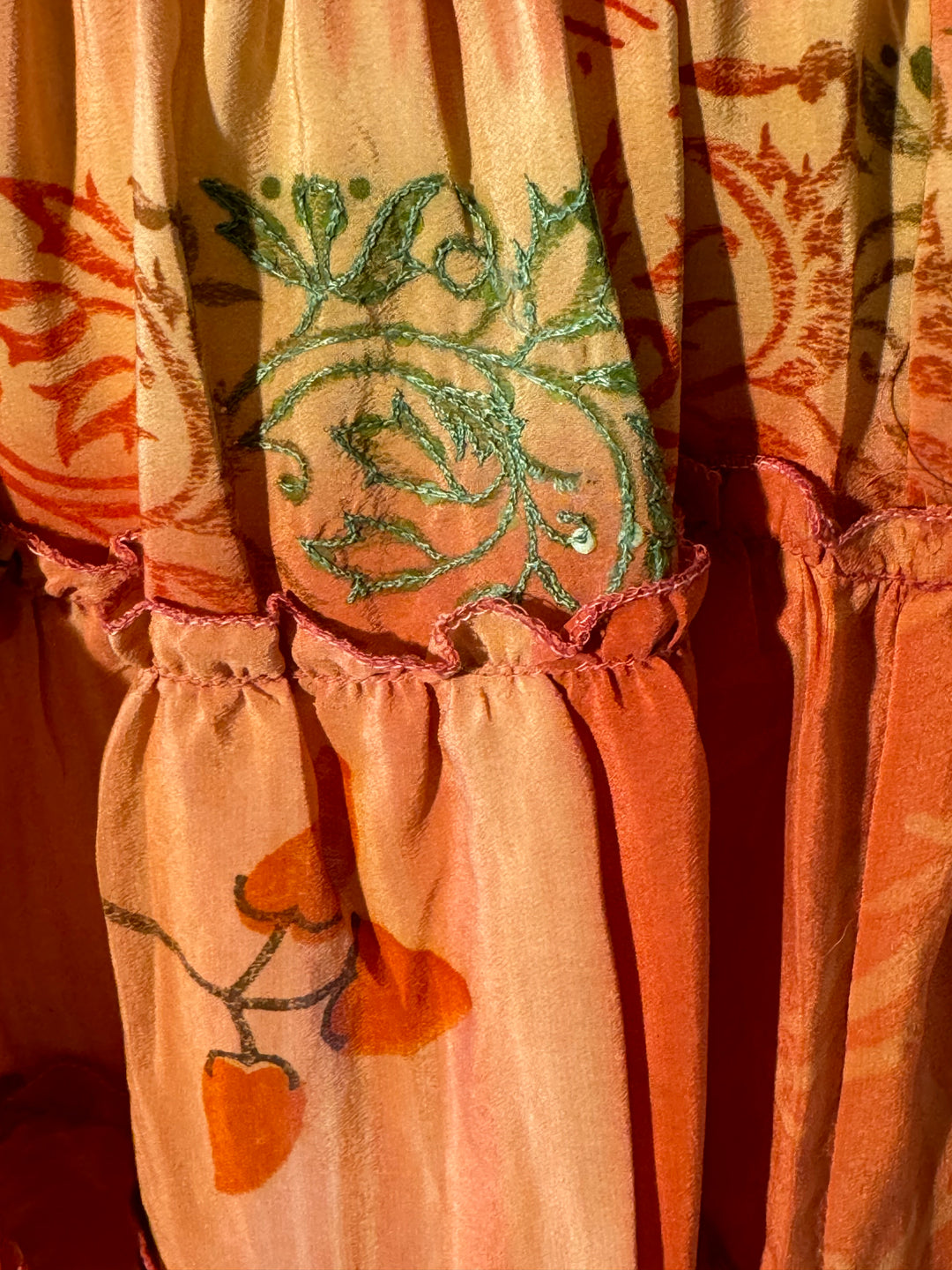 Orange vintage silk skirt tier with green embroidered vine