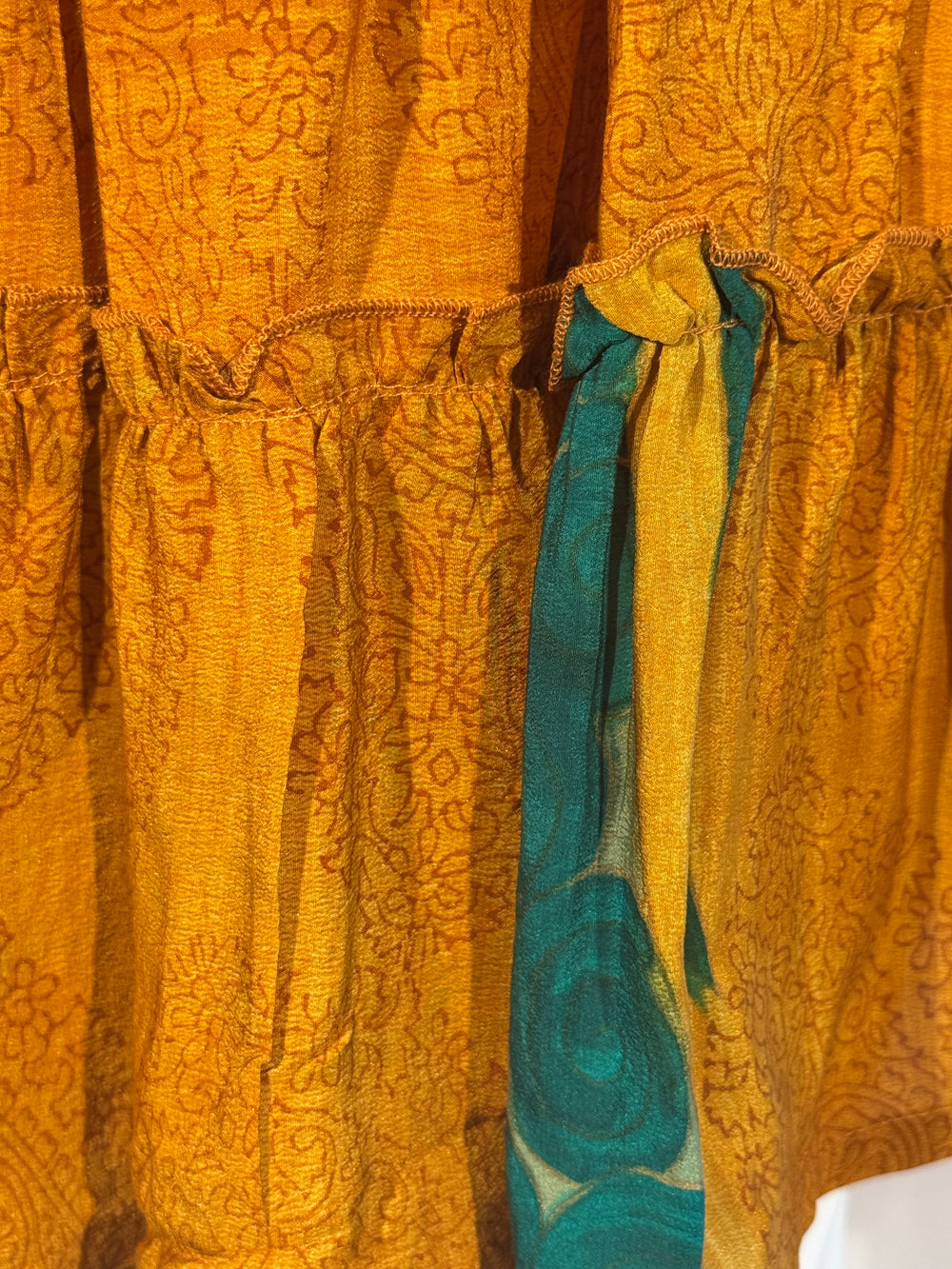 Katie Skirt by Silk Ranch in gold and one pop of blue print, elastic waist and tiers, Vintage silk and cold water washable