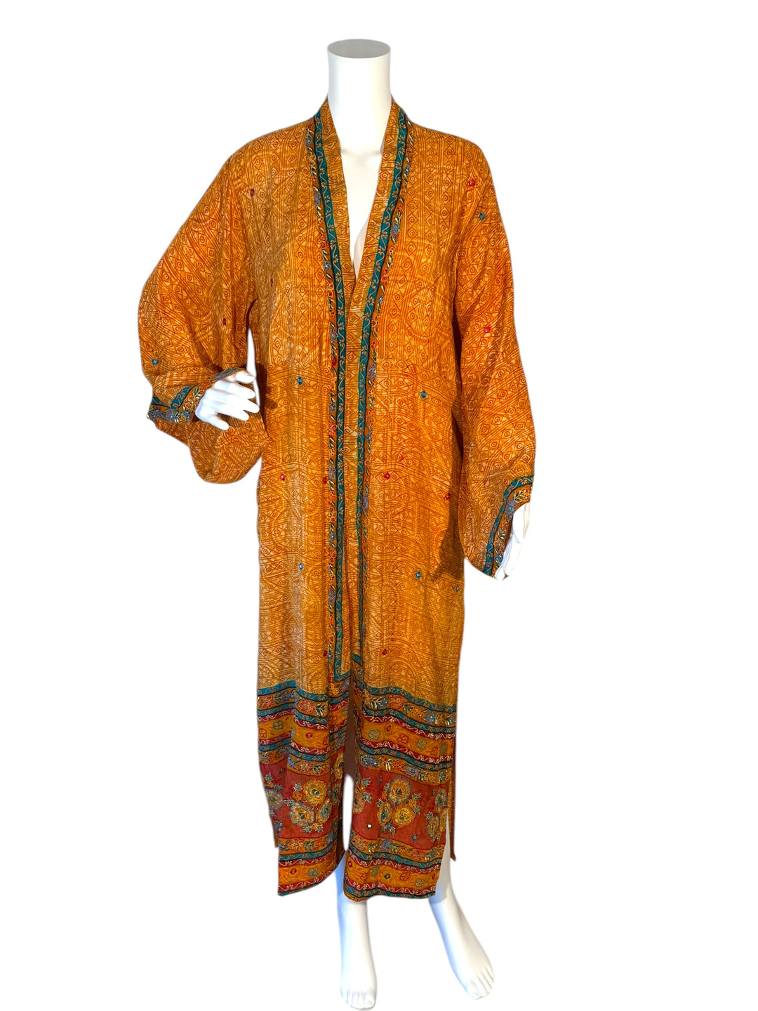 Front view of kimono in orange and red vintage silk with multi color floral embroidery and mirroring