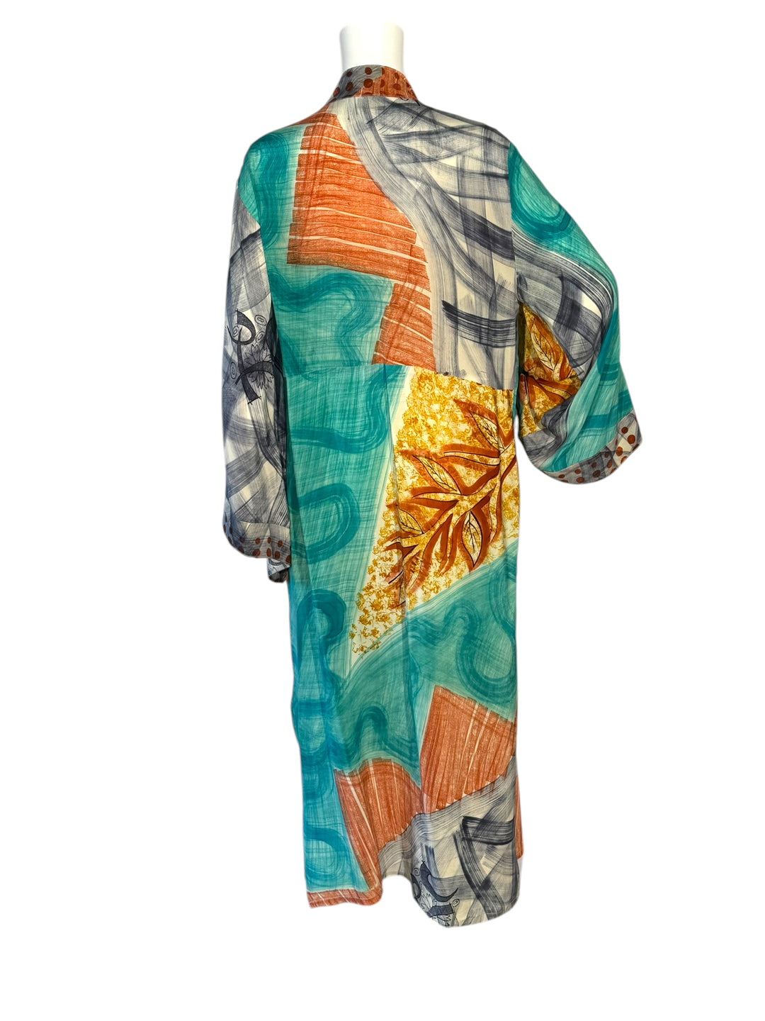 Back view of kimono in blue yellow and multi color printed vintage silk in large patterns