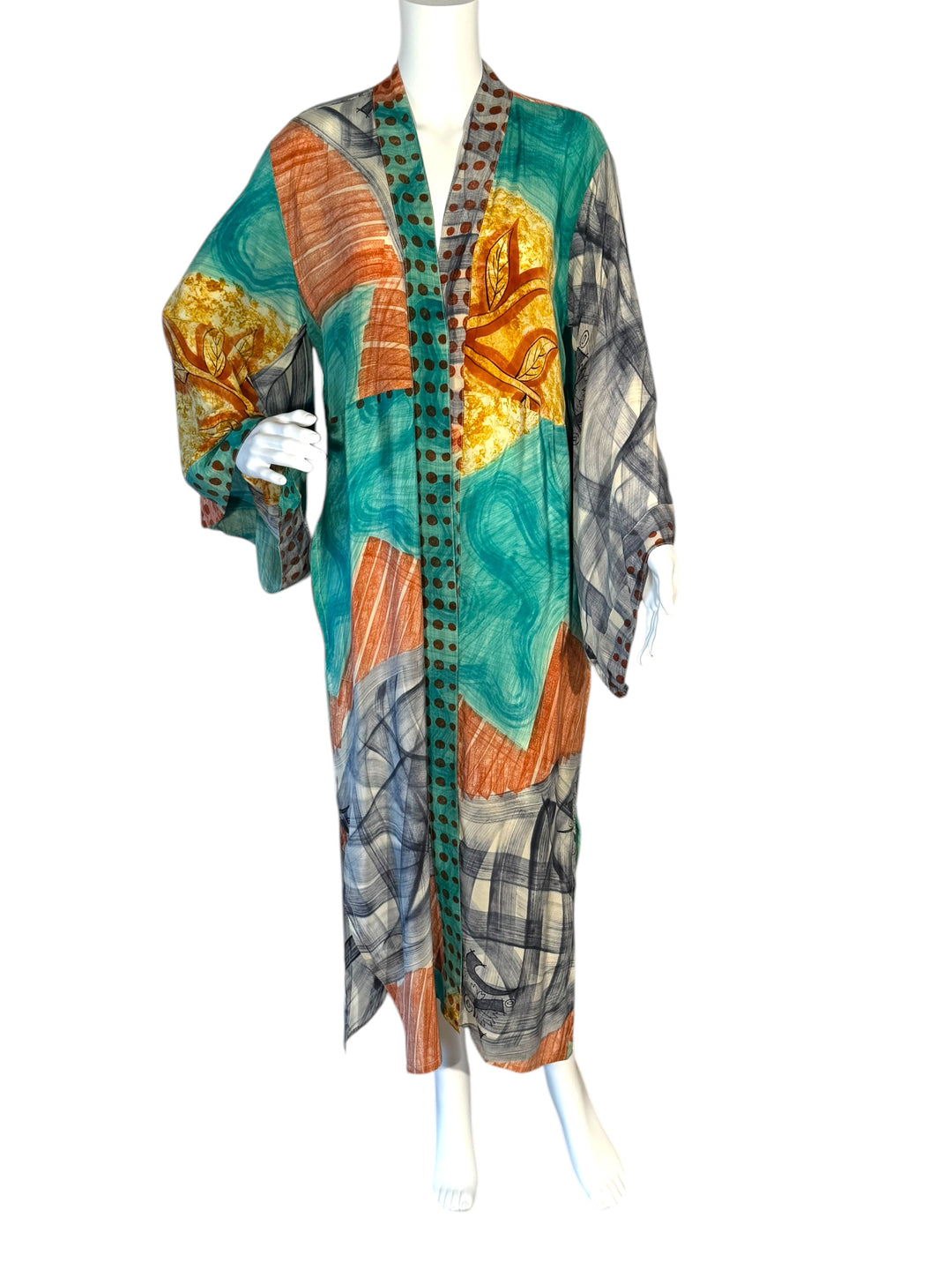 Front view of kimono in blue yellow and multi color printed vintage silk in large modern patterns