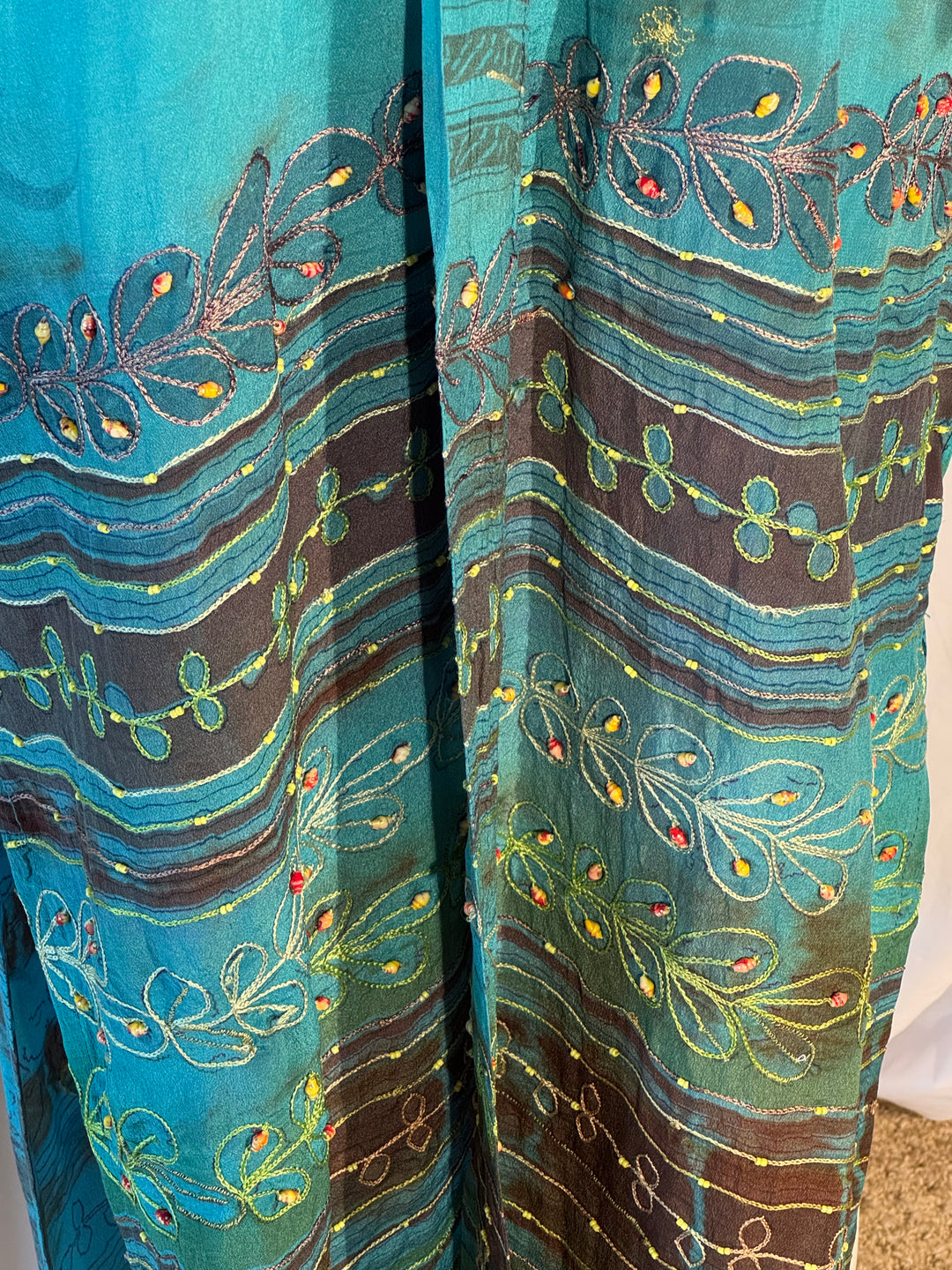 Blue dip dyed vintage silk with colorful embroidered borders