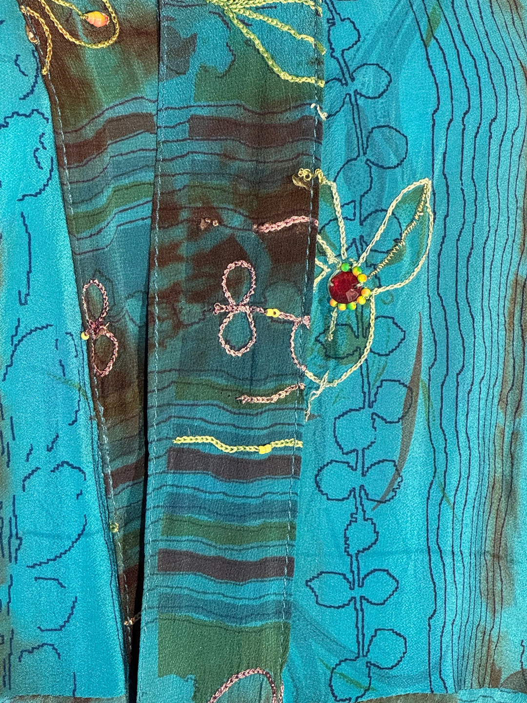 Blue dip dyed vintage silk with colorful embroidery