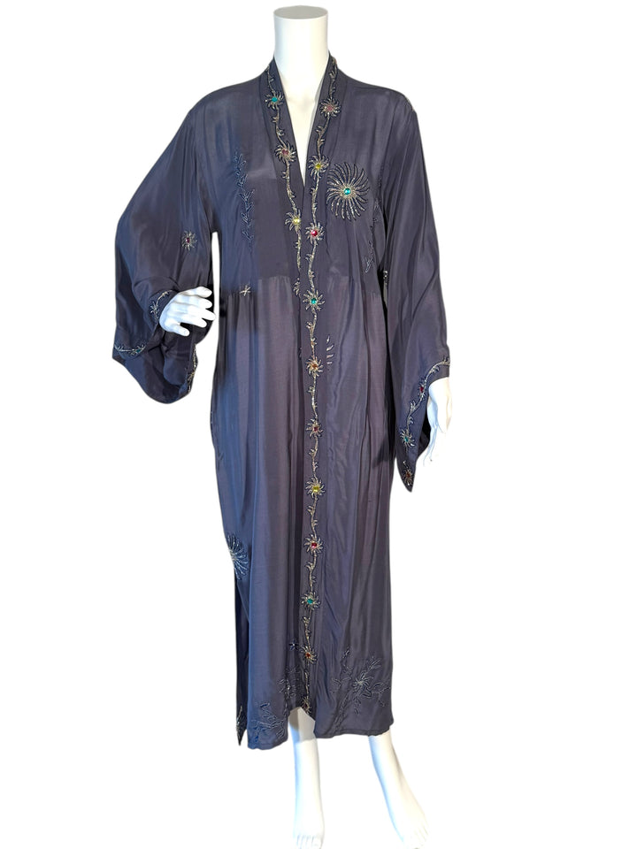 Front view of lavender vintage silk kimono with silver embroidered flowers