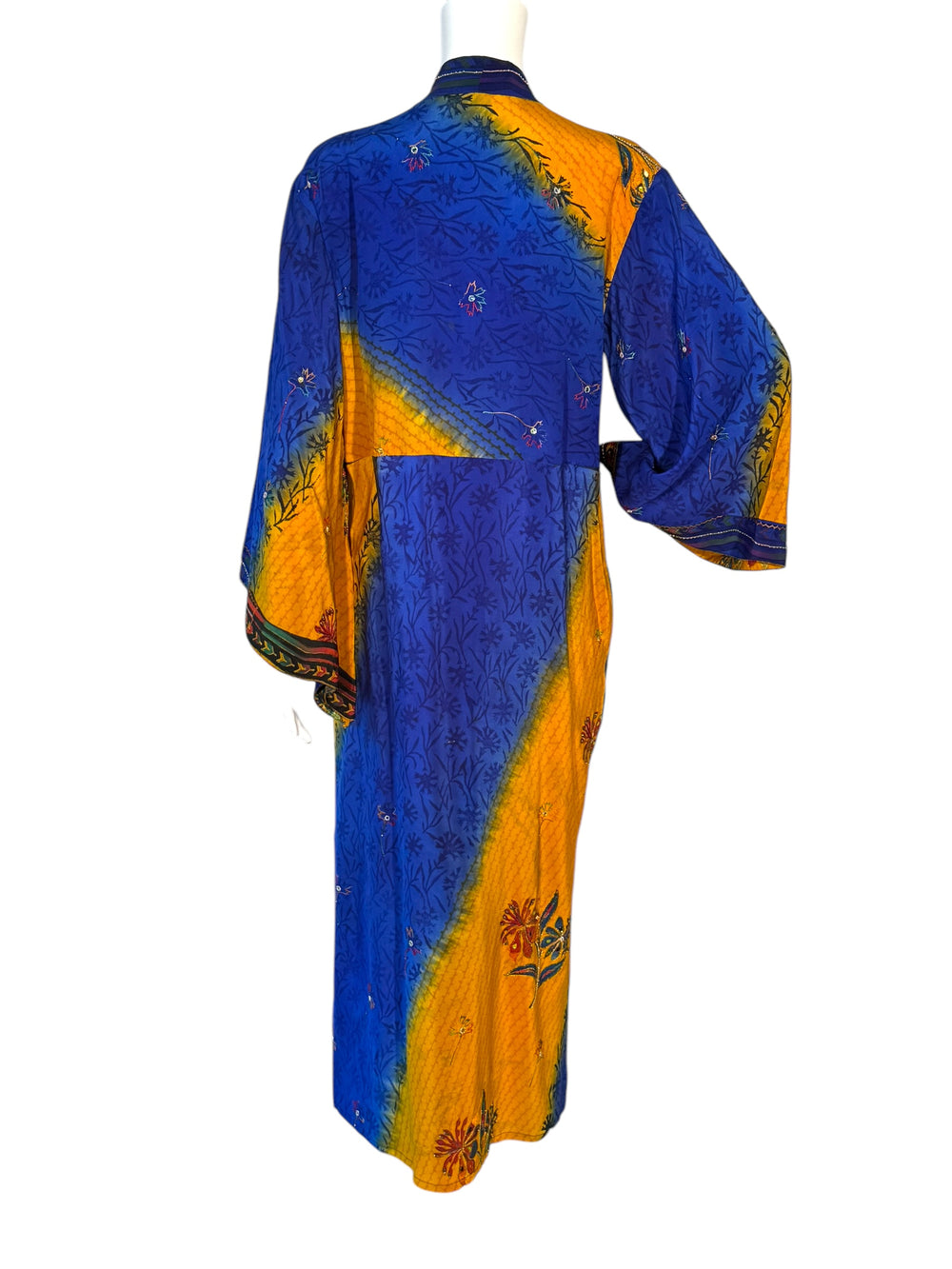 Back view of orange and blue vintage silk kimono  with embroidered flowers and faux jewels