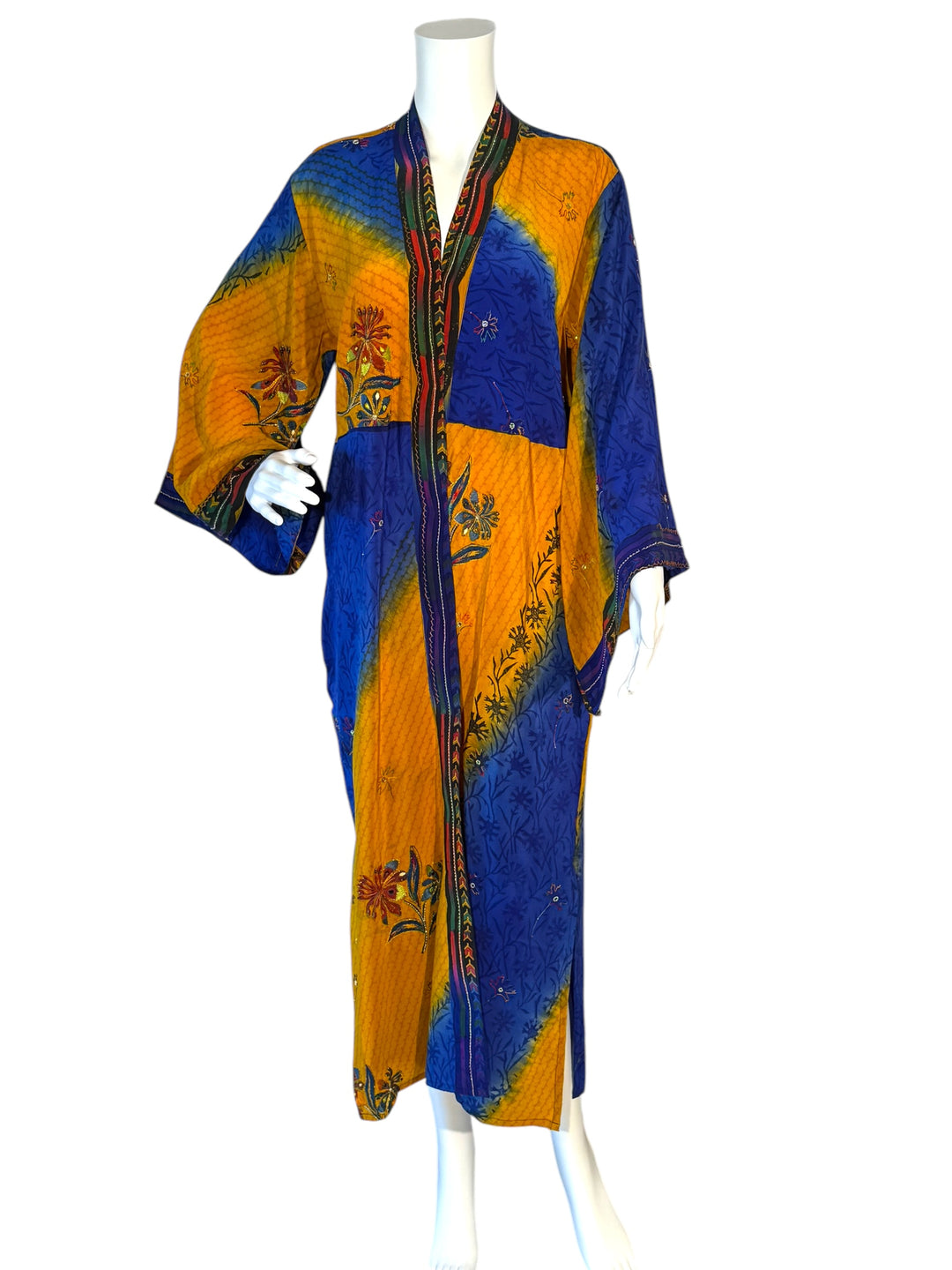 Front view of orange and blue vintage silk kimono  with embroidered flowers and faux jewels