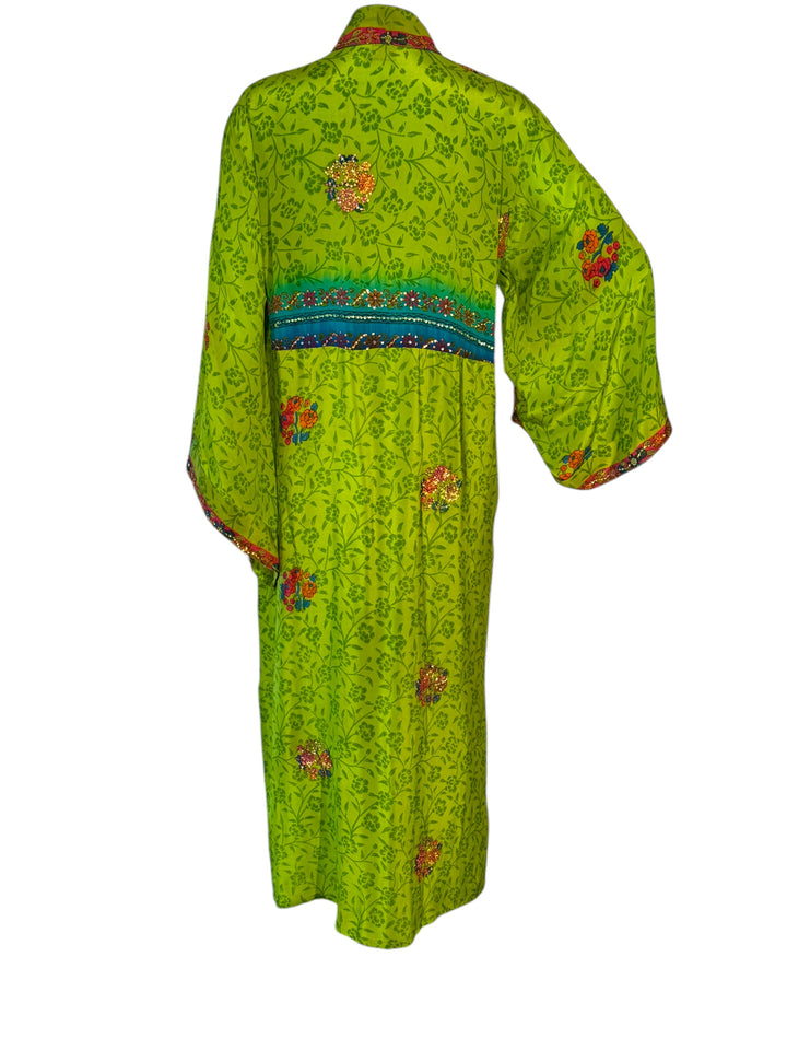 Back view of kimono in bright green floral vintage silk print with embroidered colorful flower