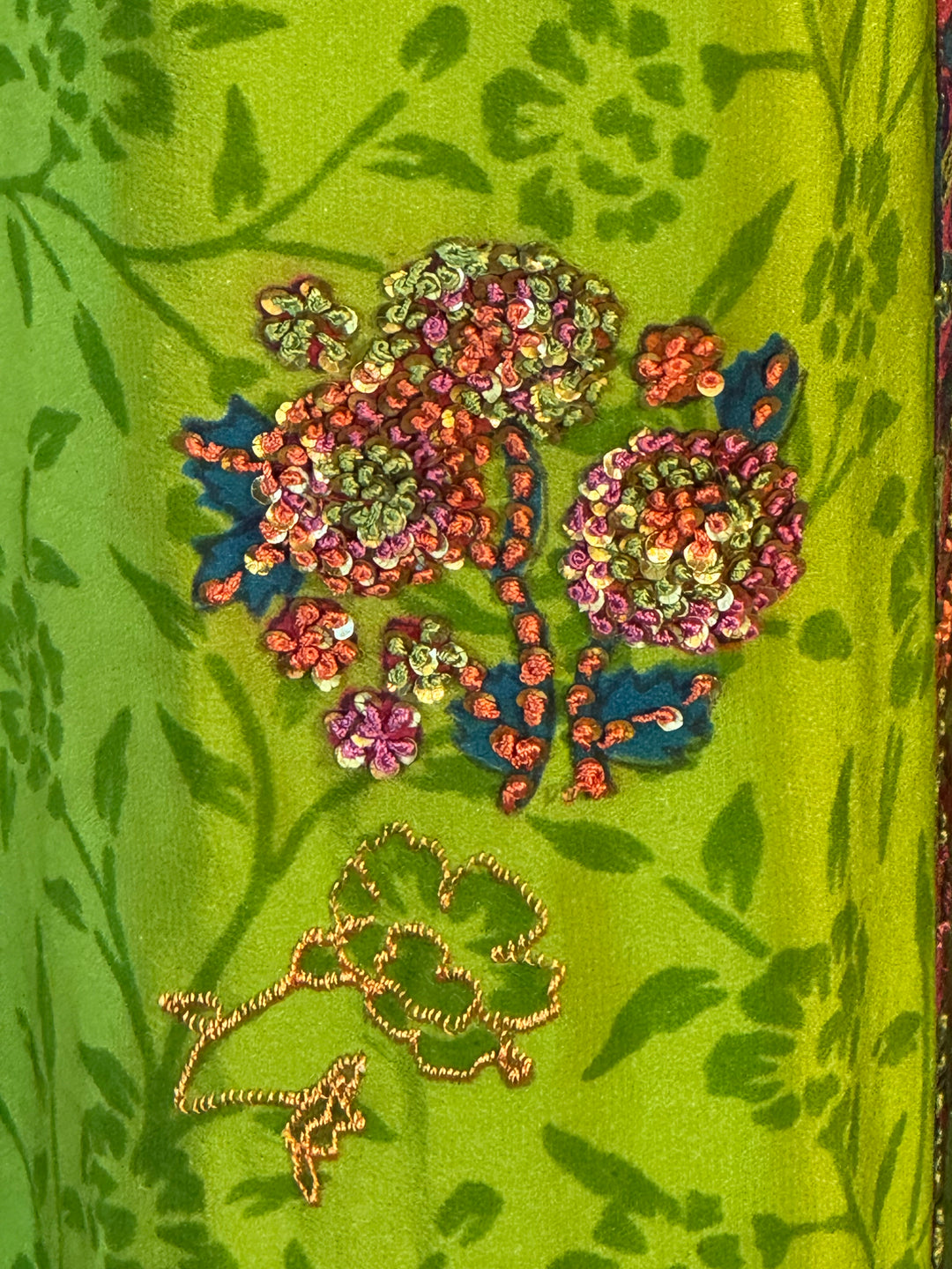 Bright green floral vintage silk print with embroidered colorful flower