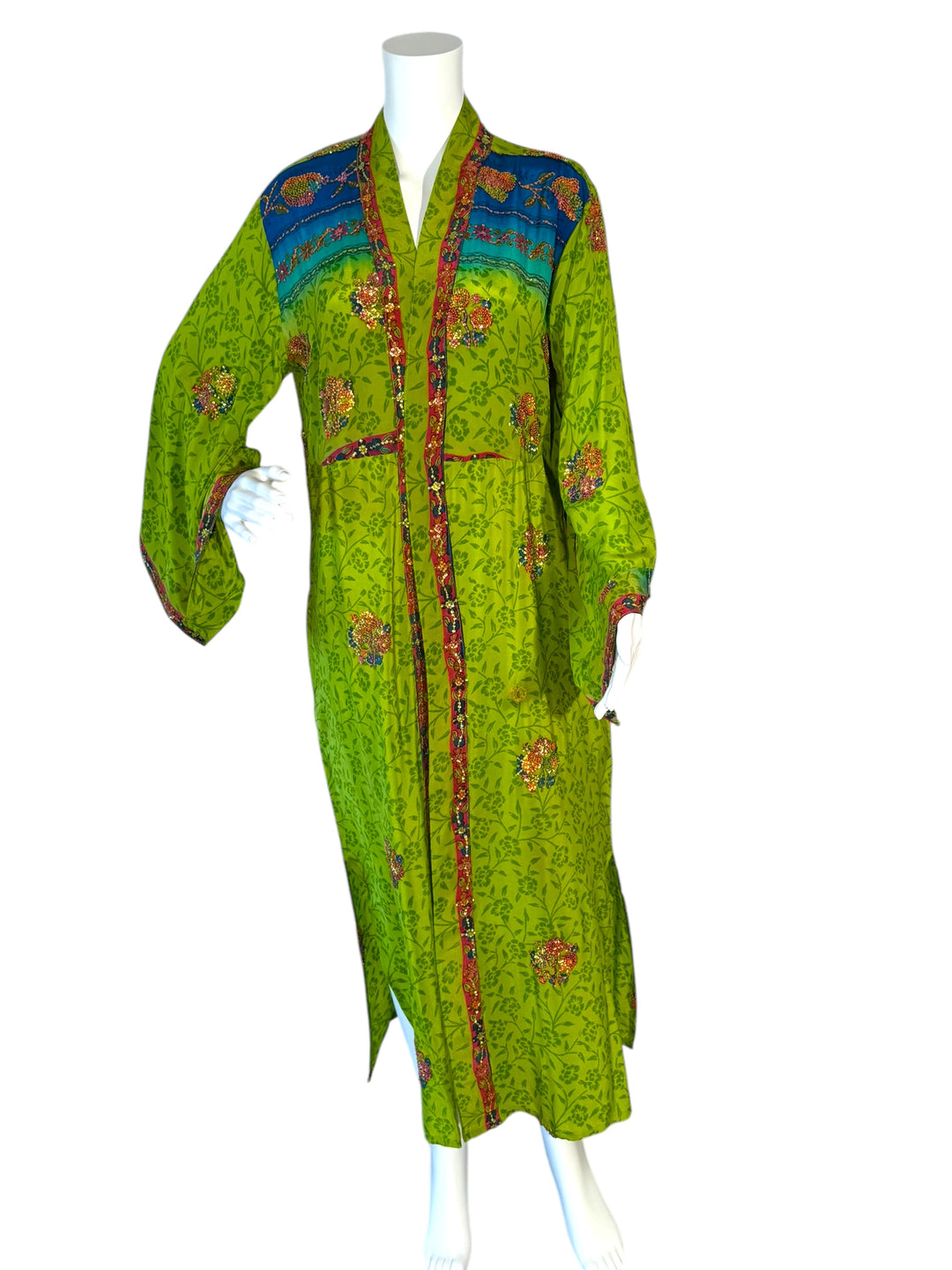 Front view of kimono in bright green floral vintage silk print with embroidered colorful flower and blue border print