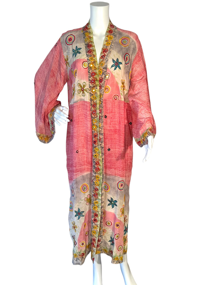 Front view of kimono in pink and cream and multi patterns of vintage silk with embroidered mirrors 