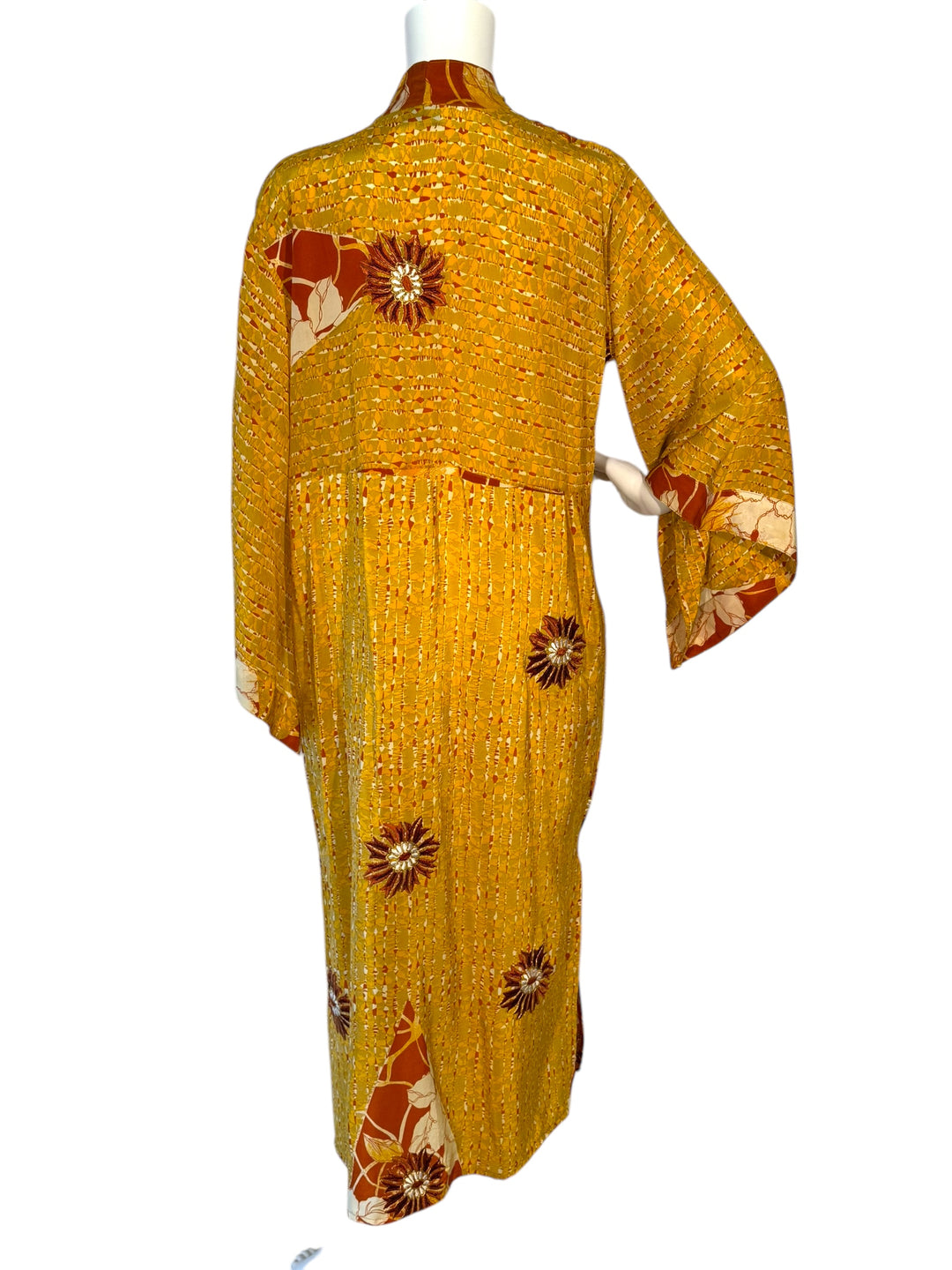 Back view of kimono in yellow print with rust and gold embroidered flowers on vintage silk