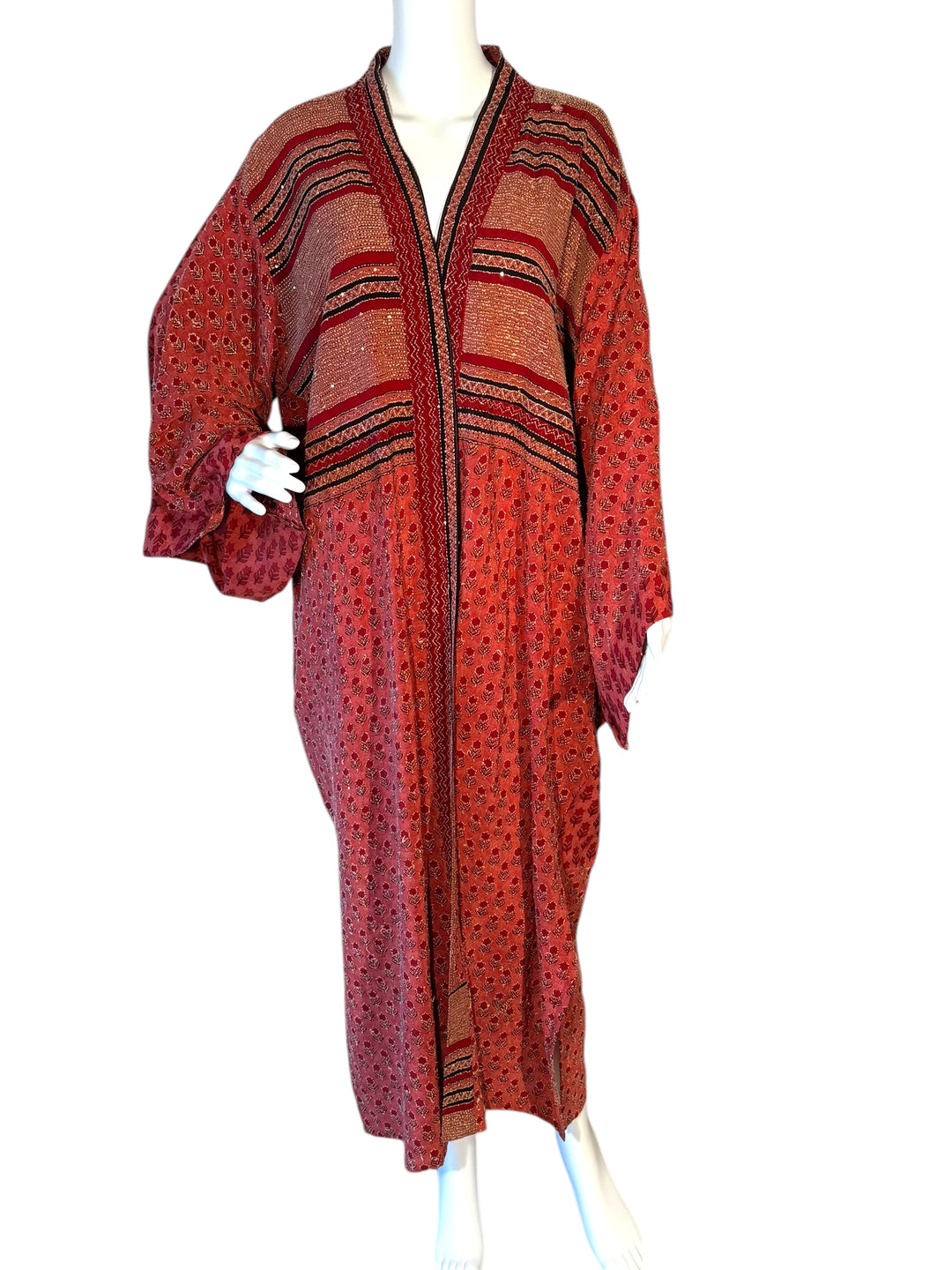 Front view of  kimono in red  pink and black small floral print in vintage silk with white threading