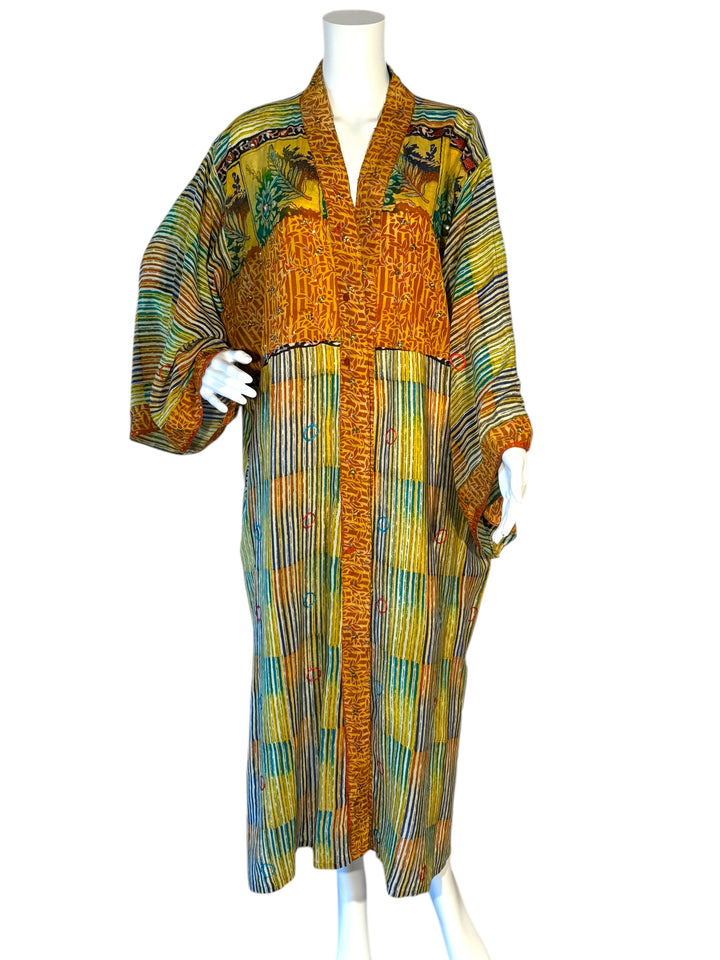 Front view of yellow orange and green patterned vintage silk kimono with colored sequins