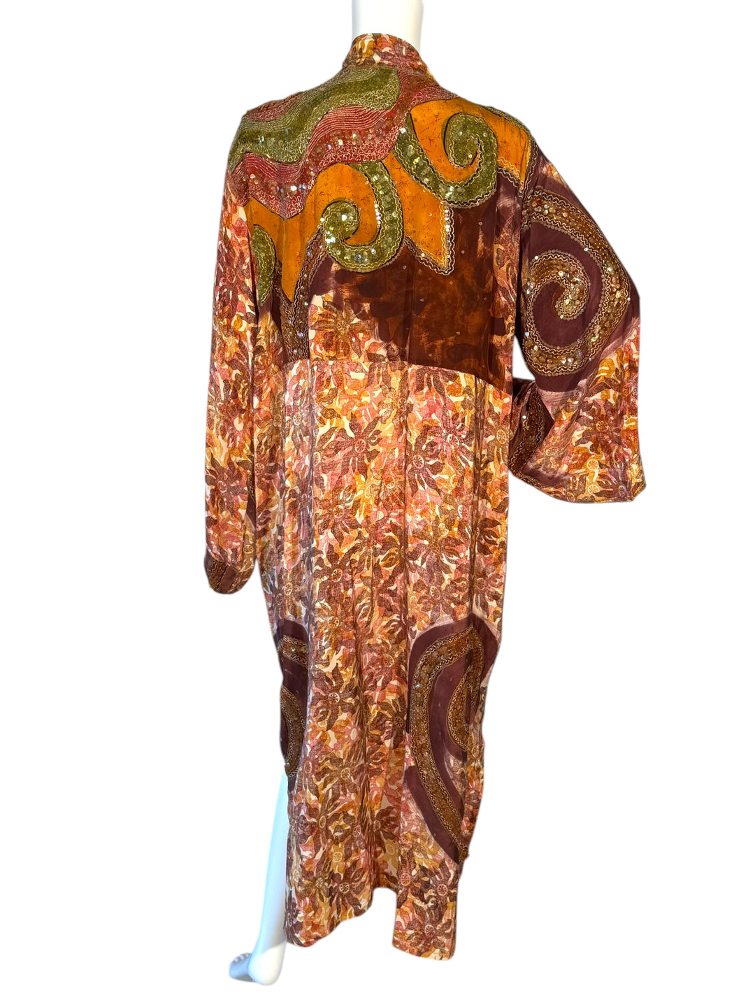 Back view of richly patterned golden, red, yellow and embroidered vintage silk kimono