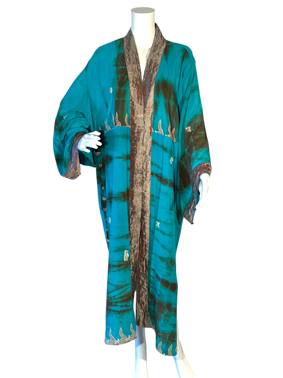 Front view of blue dip dye vintage silk kimono with golden embroidery and trim