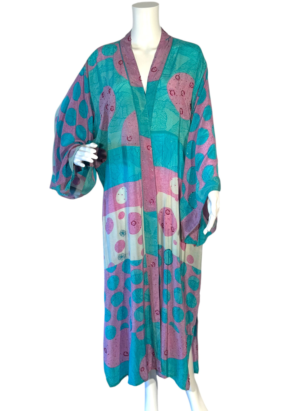 Front view of pink and blue dotted vintage silk kimono with embroidery and sequins