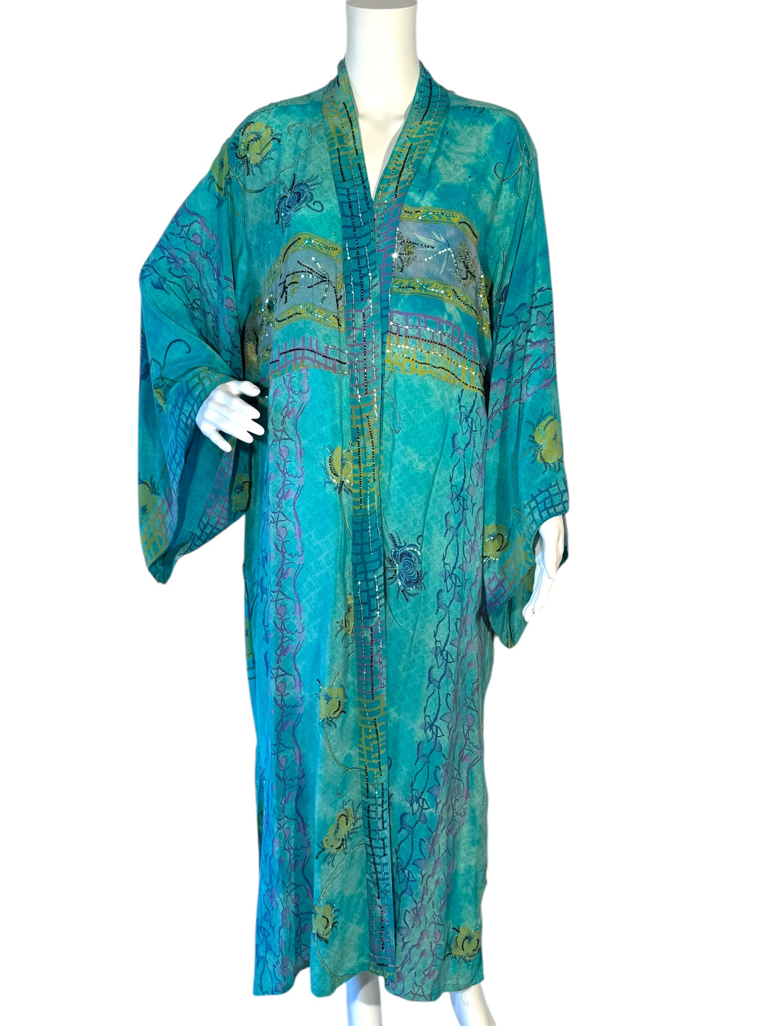 Front view blue vintage silk kimono with green designs and metallic embroidery
