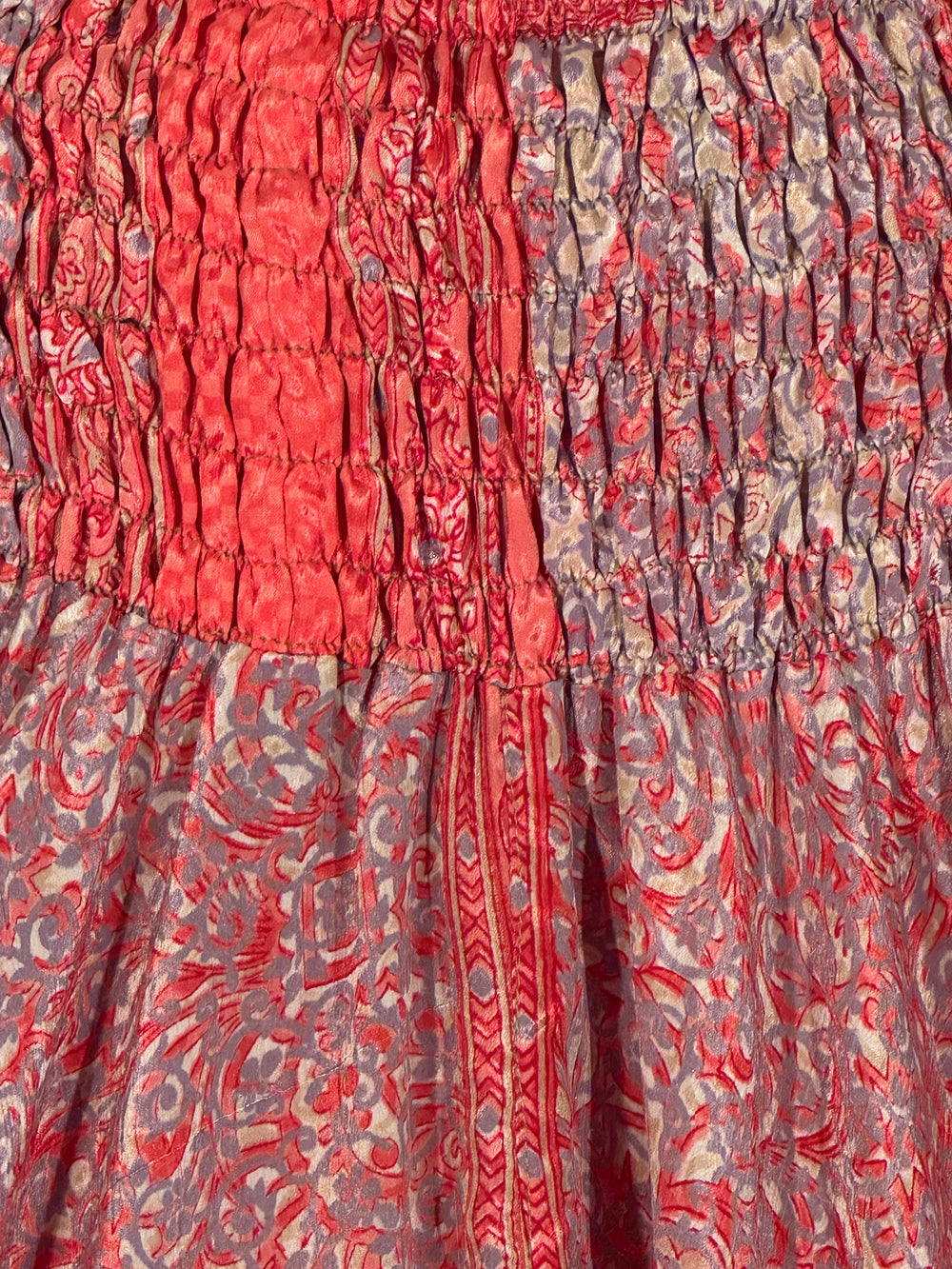 Close-up of pink and light blue patterned silk blend