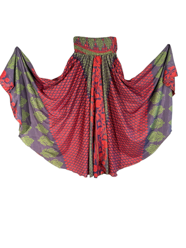 Colorful purple and red patterned silk blend palazzo pants on a white background