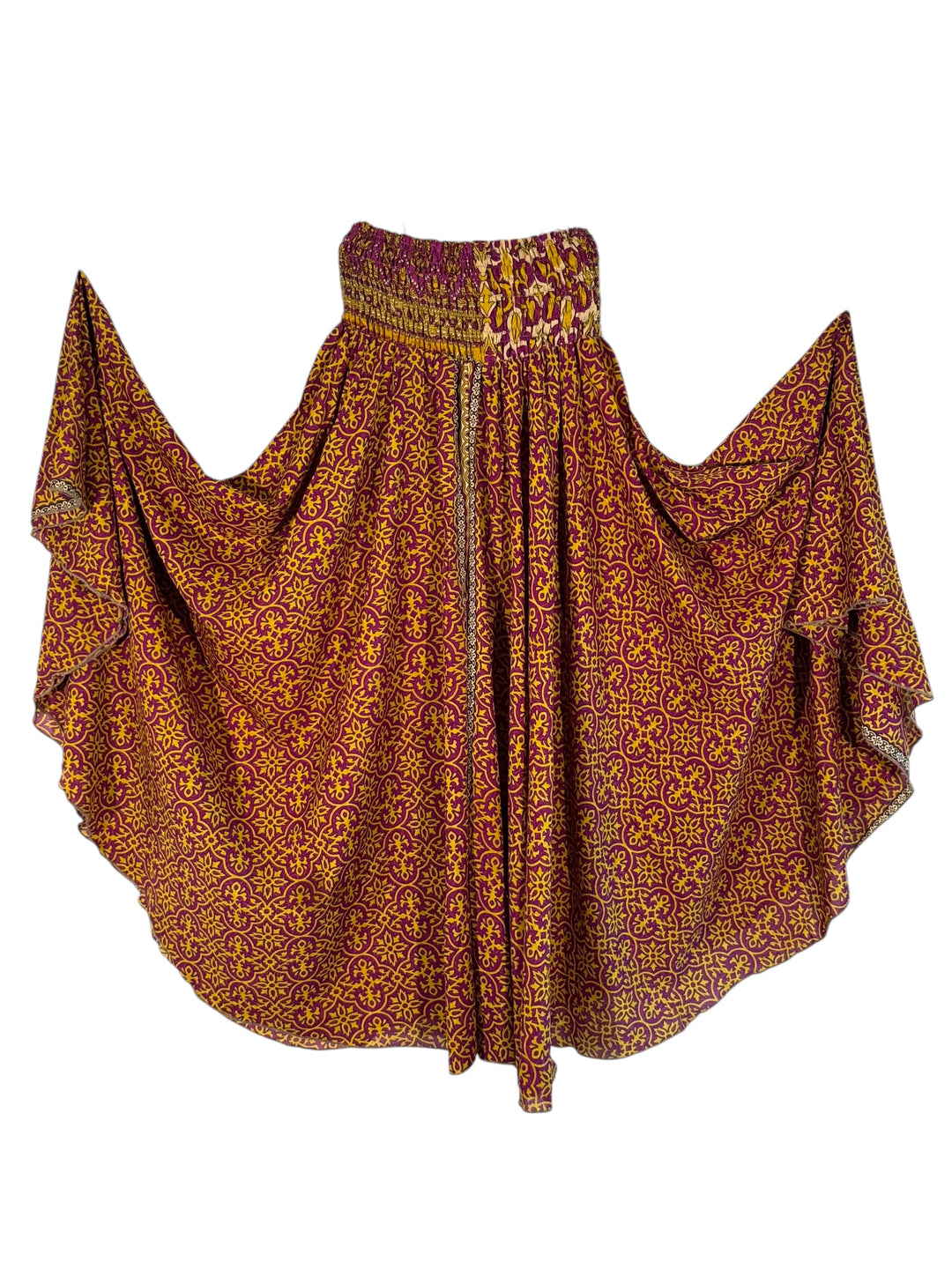 Patterned palazzo pants in purple and gold upcycled silk blend on a white background