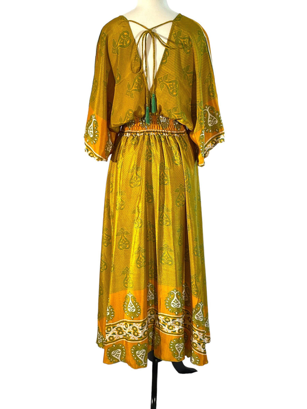 Back view of yellow paisley Boho dress in sustainable silk blend.