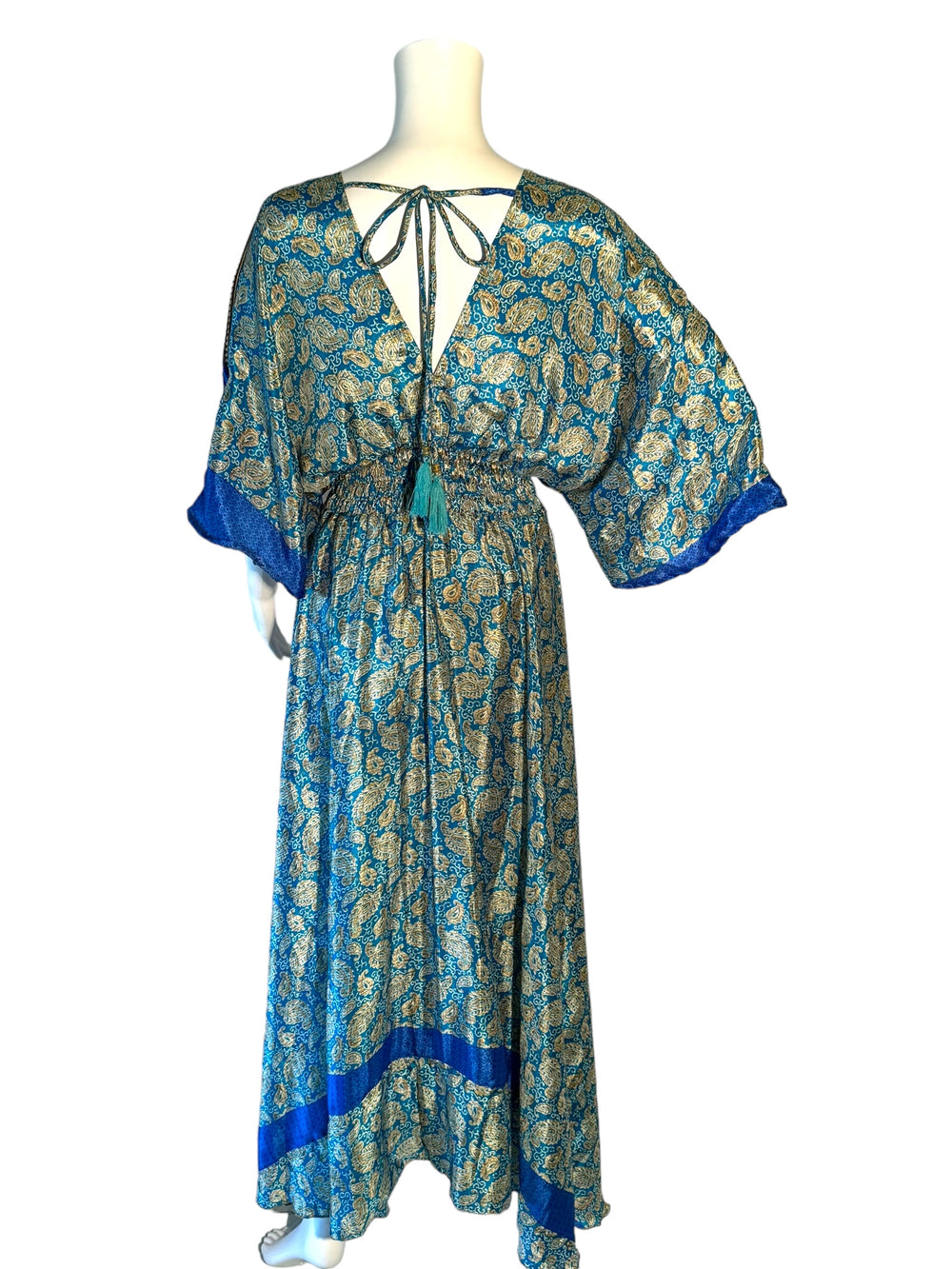 Reverse view of blue and gold print Boho dress in sustainable silk blend.