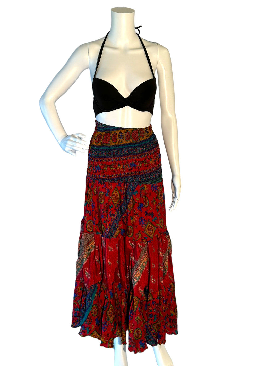 Red multi print maxi skirt in gathered tiers.  Wide elastic top can become a strapless dress.  Recycled Indian silks.