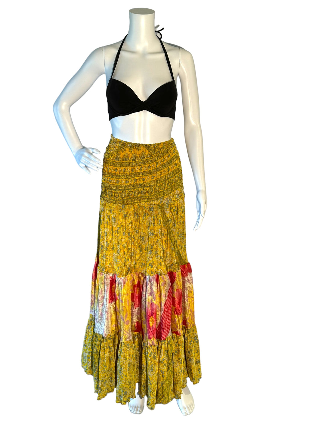 Yellow multi print maxi skirt in gathered tiers.  Wide elastic top can become a strapless dress.  Recycled Indian silks.