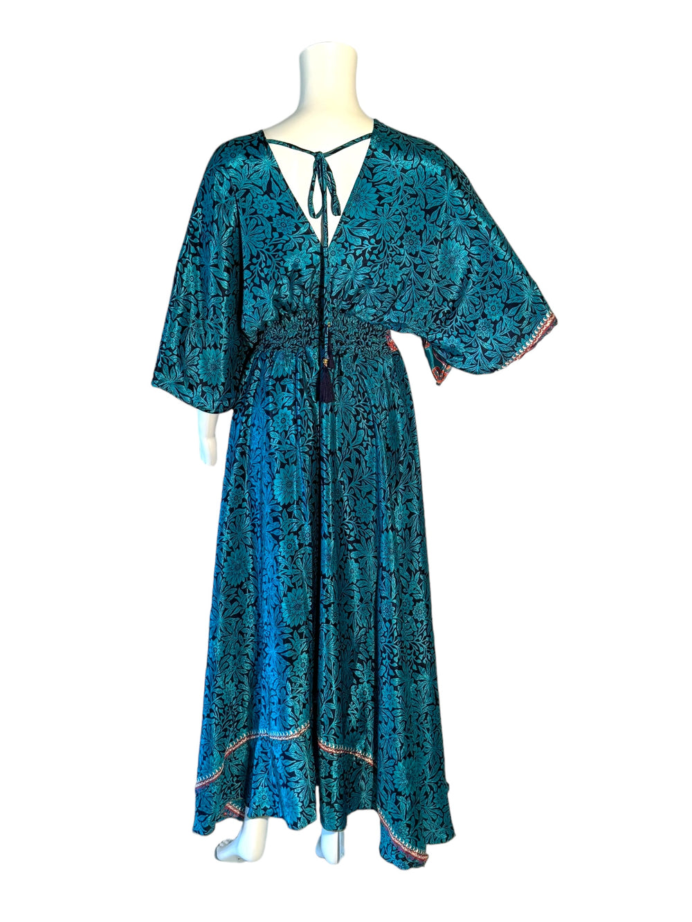 Reverse view of bright blue, navy and orange Boho dress in sustainable silk blend.