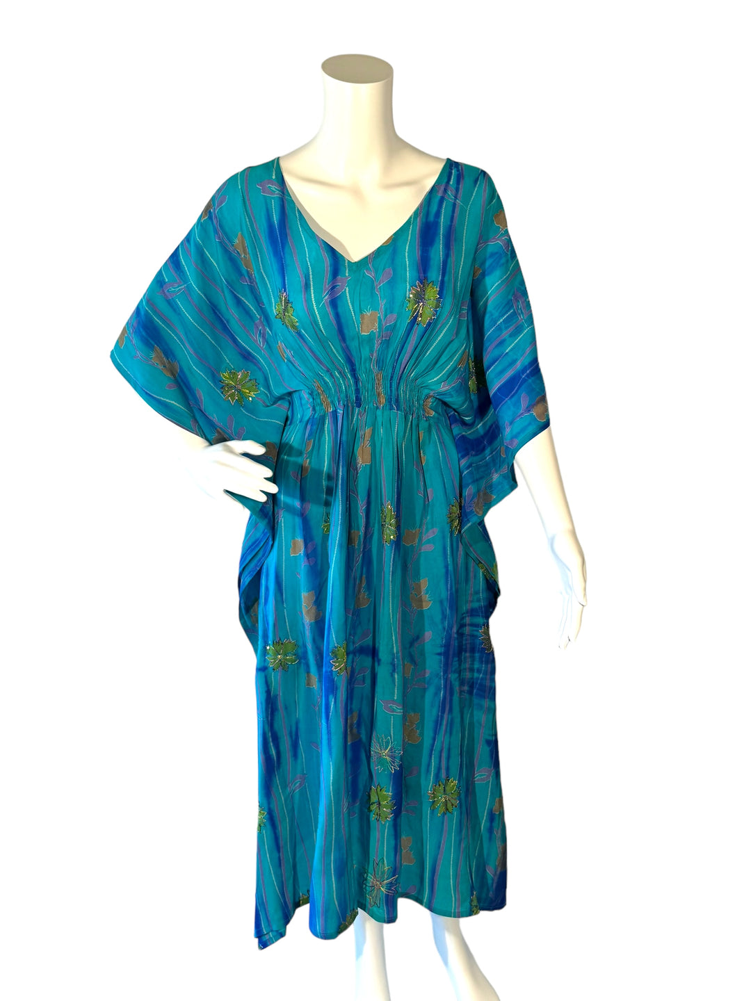 Sustainable blue silk kaftan - subtle stripes and large green embroidered and sequined flowers. V neck maxi length from vintage saree silk. Cold water washable. Easy to style and light and airy to wear.