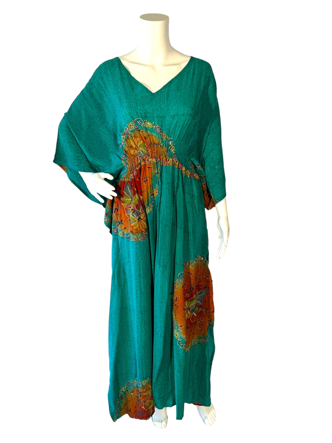 Sustainable blue/green silk kaftan - large gold sections enhanced with bright embroidery and sequins. V neck maxi length from vintage saree silk. Cold water washable. Easy to style and light and airy to wear.