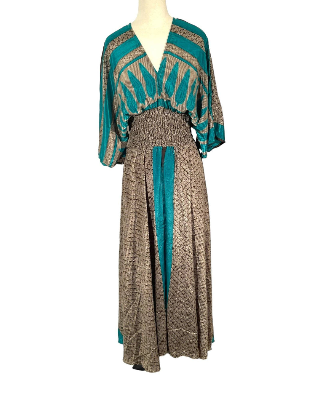 Taupe and teal  paisley print boho silk blend dress.  Midi length with V neck front and back and tassel tie.  Flattering elastic gathering under bust.