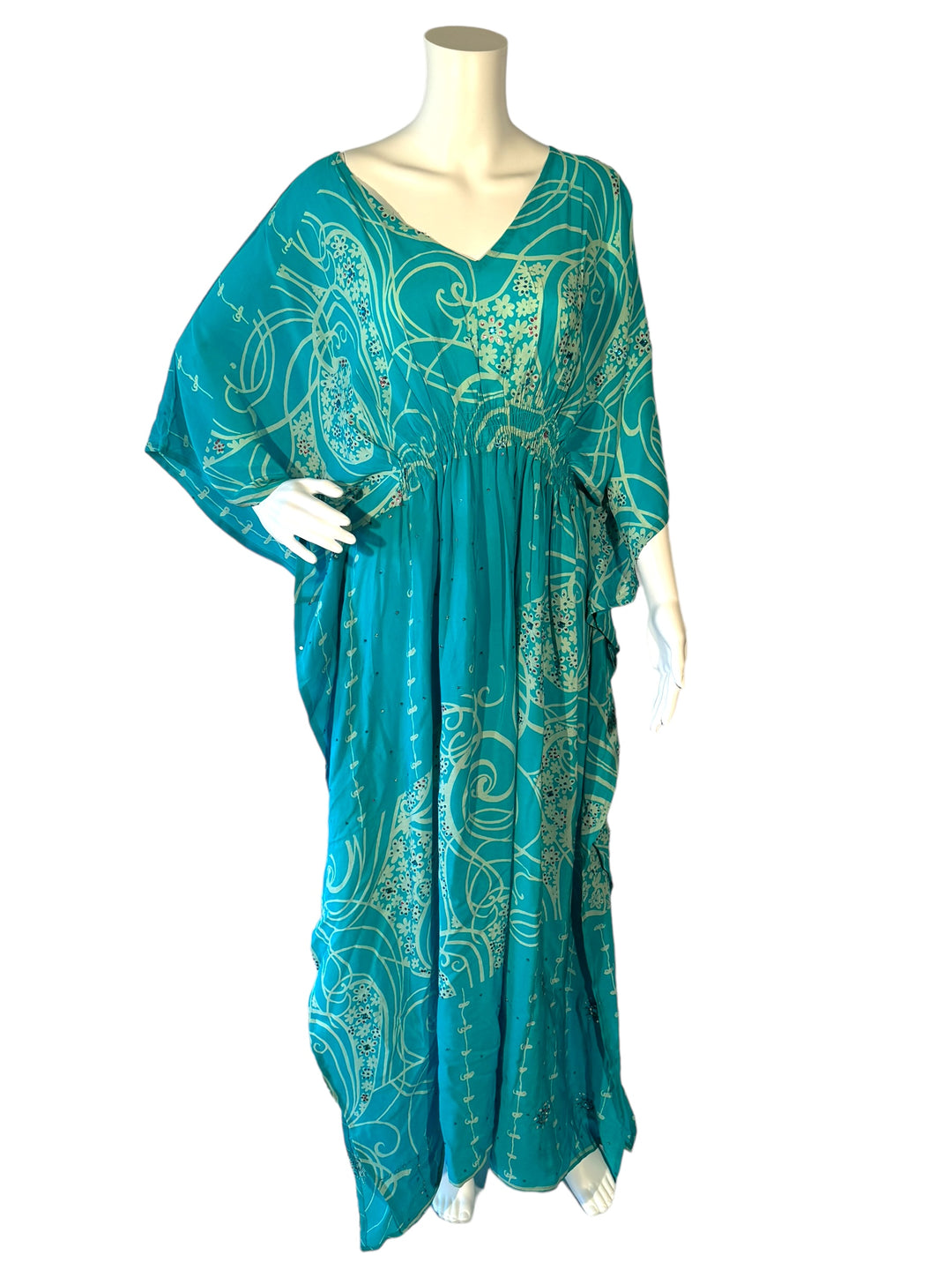 Sustainable blue silk kaftan - all over white design covered with blue and rose rhinestones. V neck maxi length from vintage saree silk. Cold water washable. Easy to style and light and airy to wear.