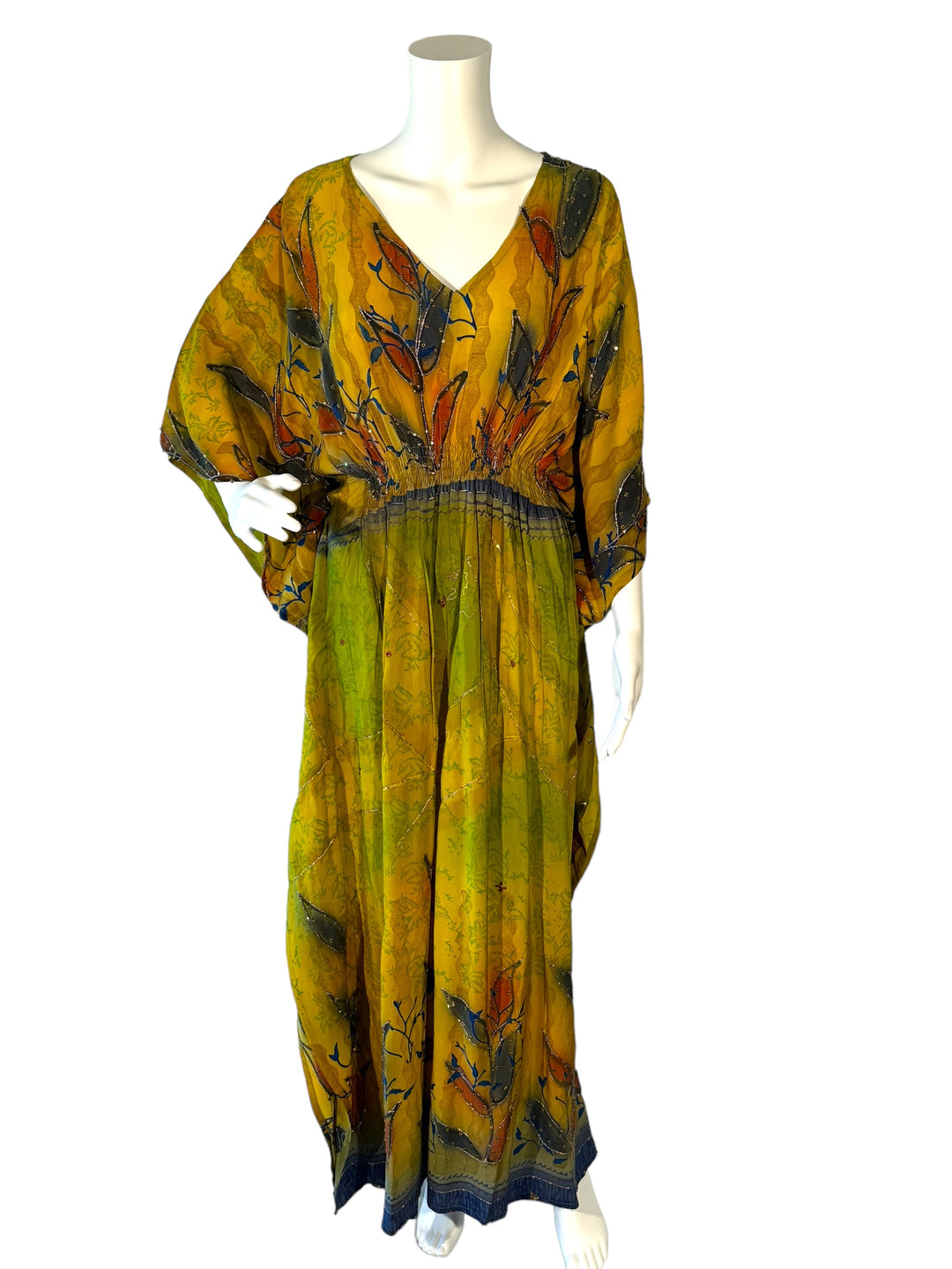 Sustainable yellow with green silk kaftan - large reeds and florals with bright sequins. V neck maxi length from vintage saree silk. Cold water washable. Easy to style and light and airy to wear.