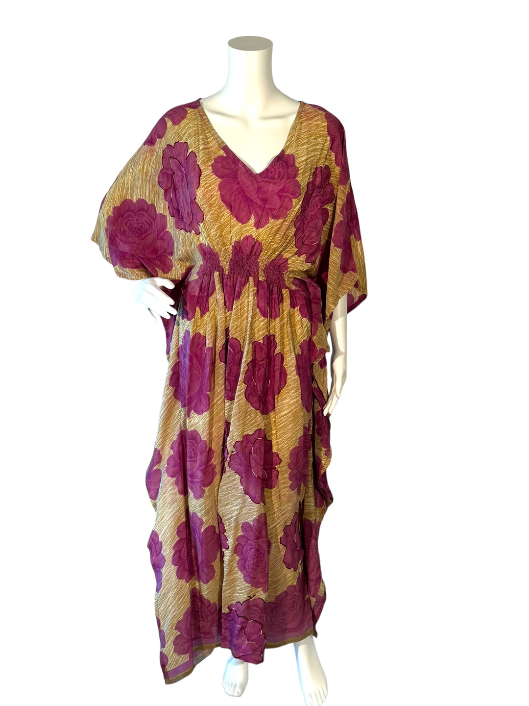 Sustainable beige with purple silk kaftan - some of the flowers are meticulously outlined with embroidery. V neck maxi length from vintage saree silk. Cold water washable. Easy to style and light and airy to wear.