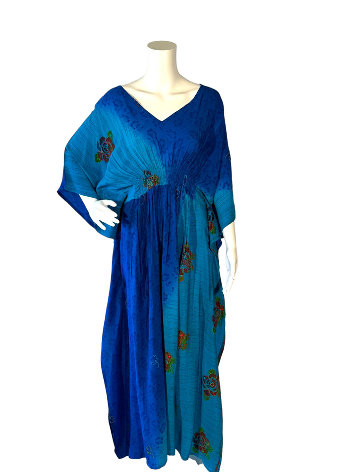 Sustainable two toned blue silk kaftan - accented with beautifully embroidered flowers. V neck maxi length from vintage saree silk. Cold water washable. Easy to style and light and airy to wear.