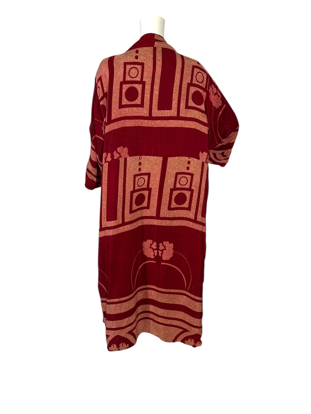 Inside back view of reversible kimono in light and dark red vintage silk in graphic pattern