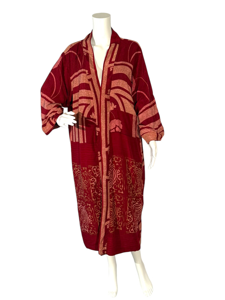 Inside front view of reversible kimono in light and dark red vintage silk in graphic pattern