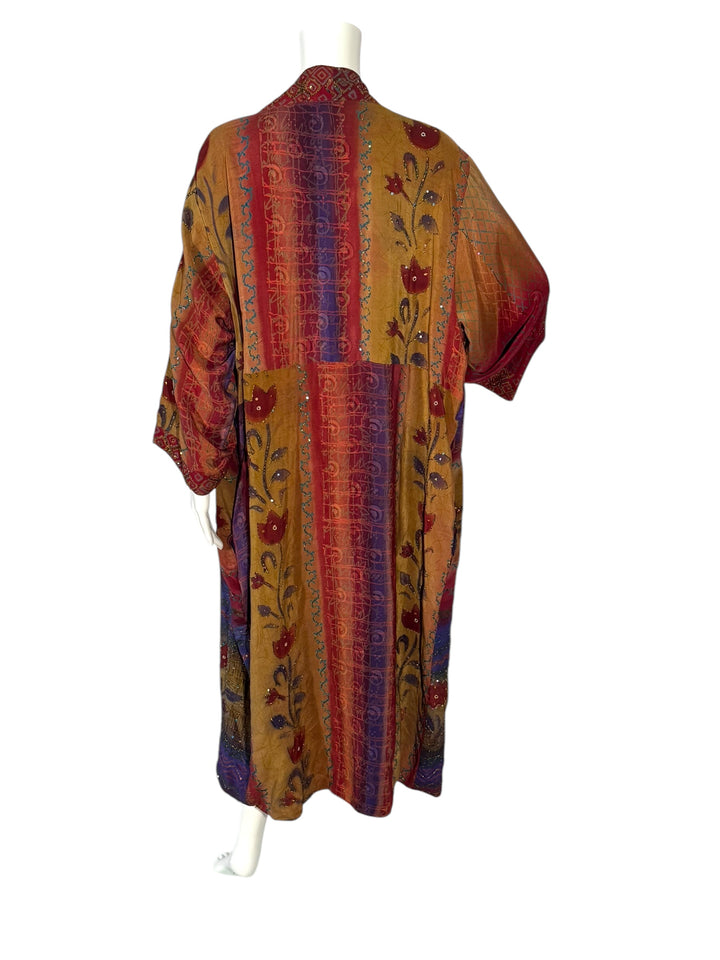 Outside back view of reversible kimono in tan red and blue vintage silk with floral and stripe pattern and embroidery