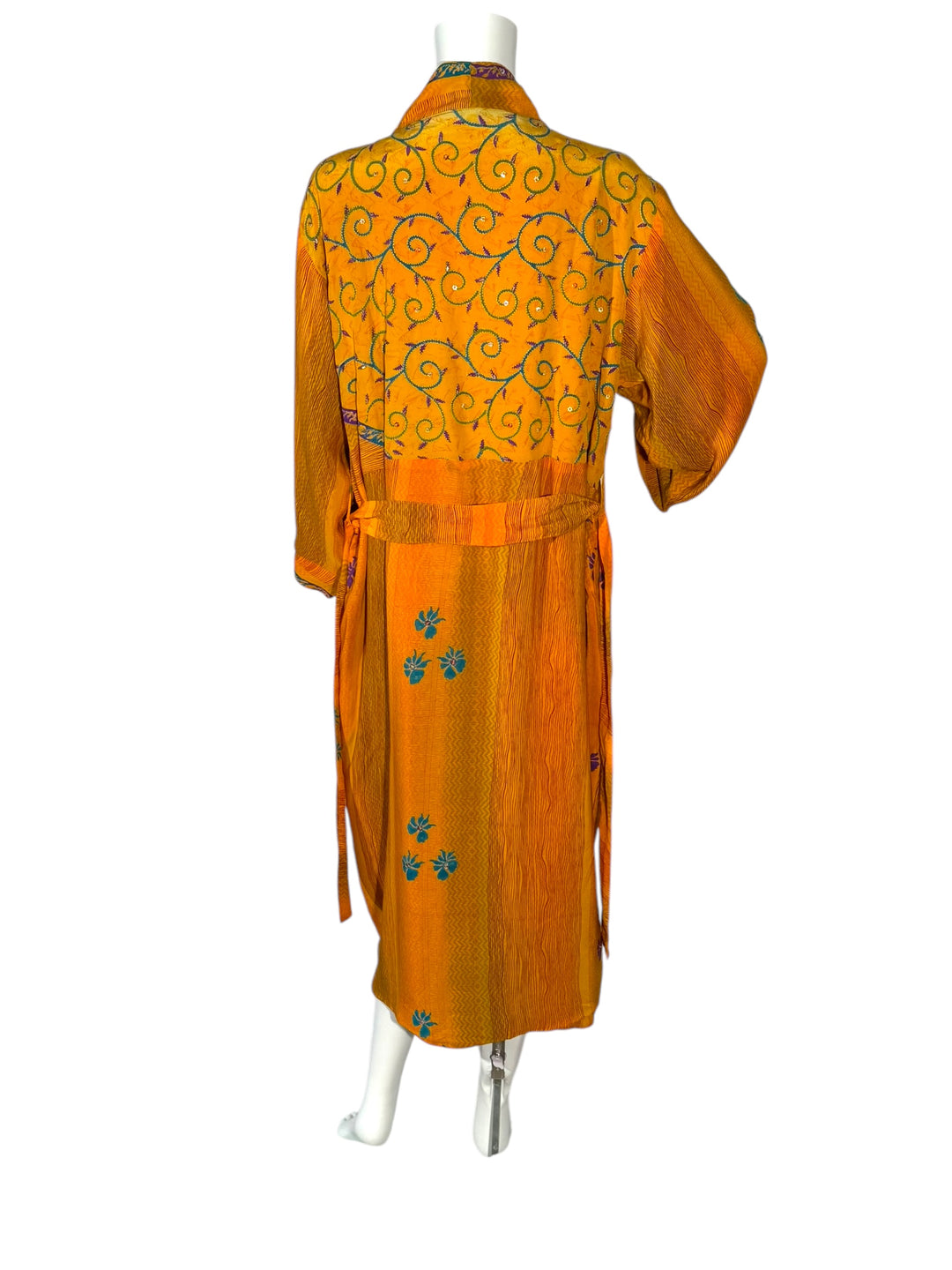 Outside back view of reversible kimono in orange vintage silk with green floral and vine pattern and sequined embroidery