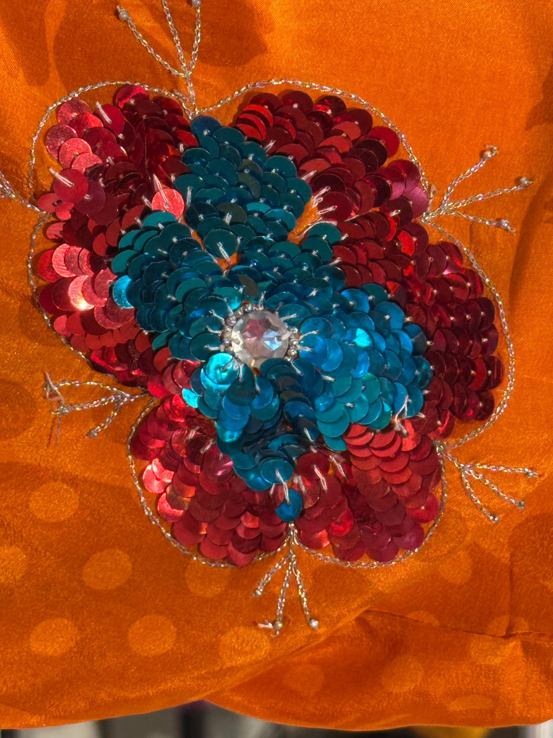 Orange vintage silk with red and blue sequined flower