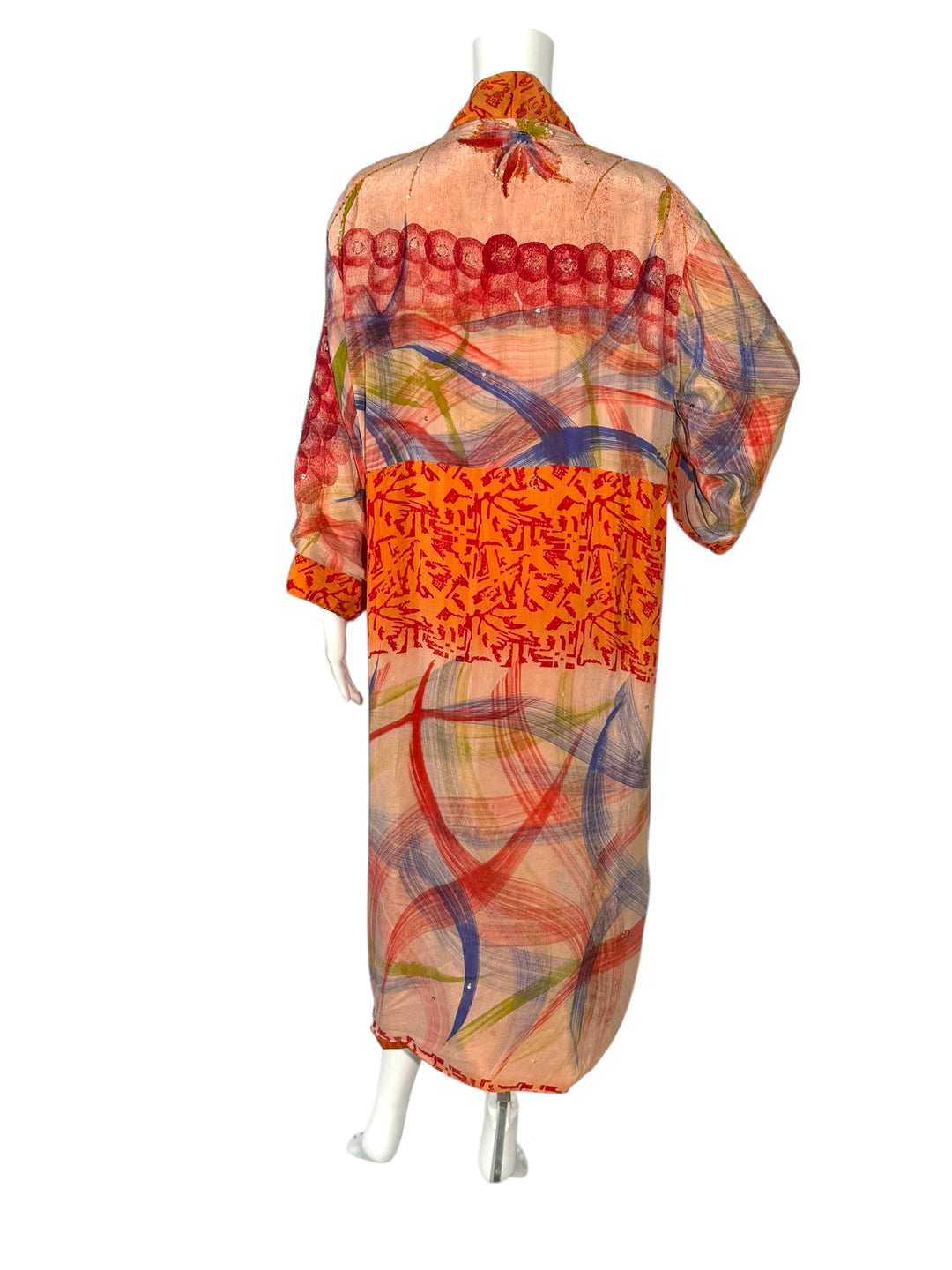 Back inside view of reversible kimono in tan red orange and blue graphic print vintage silk with sequins