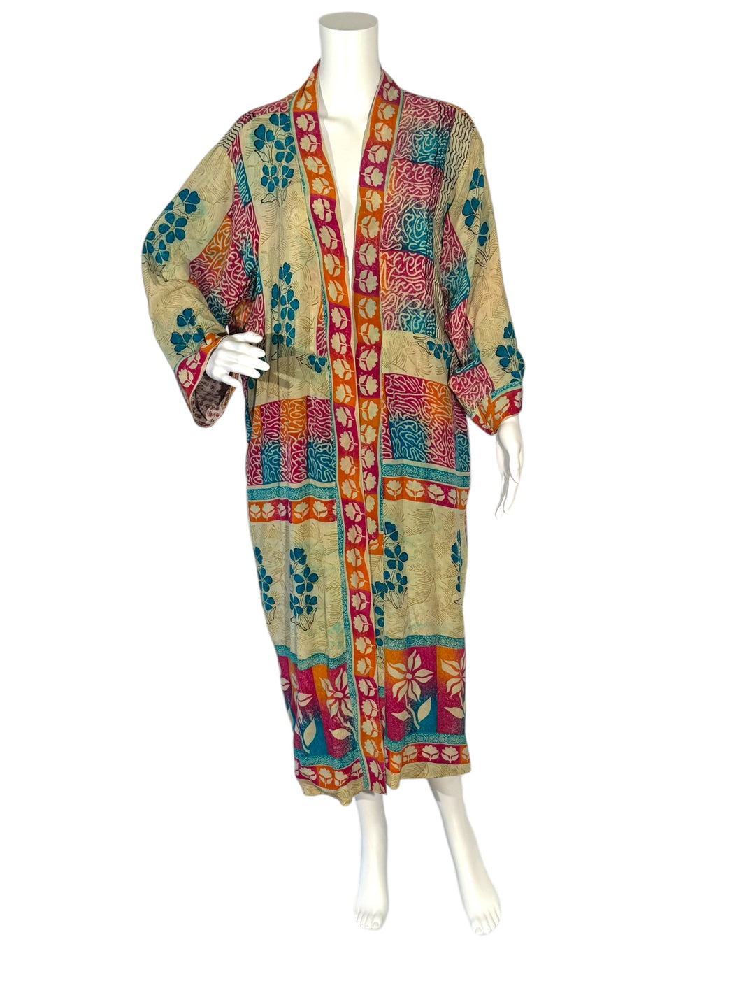 Inside front view of reversible vintage silk kimono in tan with multi color block printing