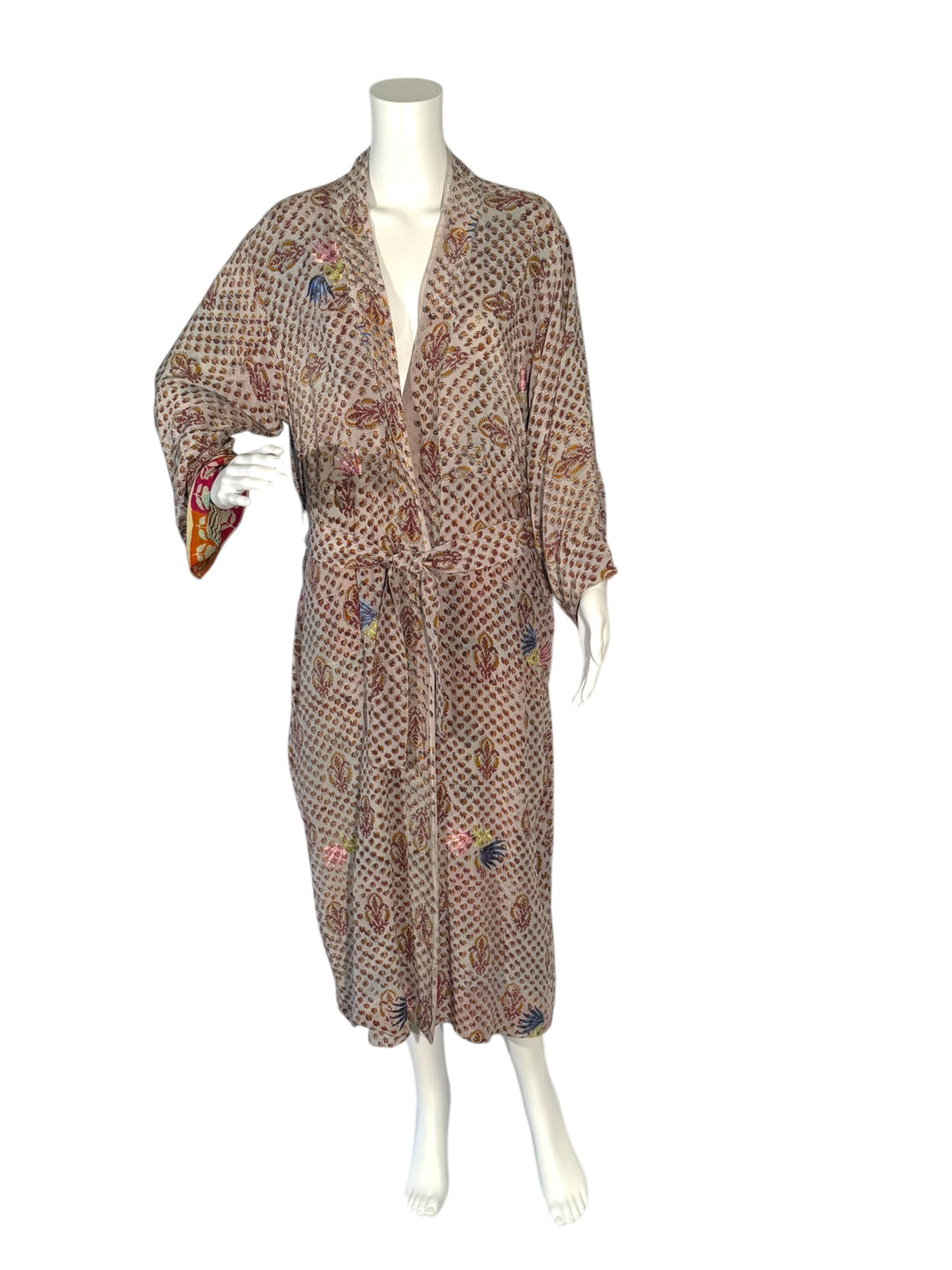 Outside front view of vintage silk reversible kimono in tan paisley with pink and blue embroidered flowers